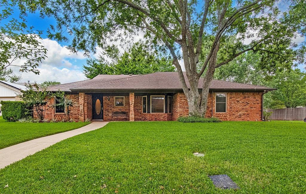 Stunning Renovated Corner Lot Home with Backyard Oasis! Prepare to be impressed by this beautifully updated corner-lot home, completely refreshed from top to bottom with premium modern finishes and a backyard built for entertaining. Step into a bright, modern interior featuring brand new LVP flooring and fresh paint throughout the entire home. Elegant new crown molding highlights the spacious living room, master suite, and hallway bathroom. Every detail has been addressed, including new interior and exterior doors, upgraded decorative lever switches, and sleek new plugs. Brilliant new LED lighting illuminates the kitchen, breakfast nook, master bedroom, and master bath, while a classic brick fireplace serves as a cozy focal point in the main living space. The home boasts a highly flexible floor plan, including a massive fourth bedroom with a half bath that can easily serve as a second living area, media hub, or bonus game room. Updates in this home offer peace of mind, featuring energy-efficient replacement windows installed within the last 5 years and a high-performance Lennox AC system. The outdoor space is a true private retreat, fully enclosed by a secure 8 foot privacy fence and maintained by an integrated sprinkler system. The backyard features a sparkling inground pool framed by an expansive 24x40 concrete deck and a unique circular sundeck at the deep end. Relax or entertain rain or shine under the durable 15x15 metal cabana. Please note this home will not be FHA eligible until September 5th