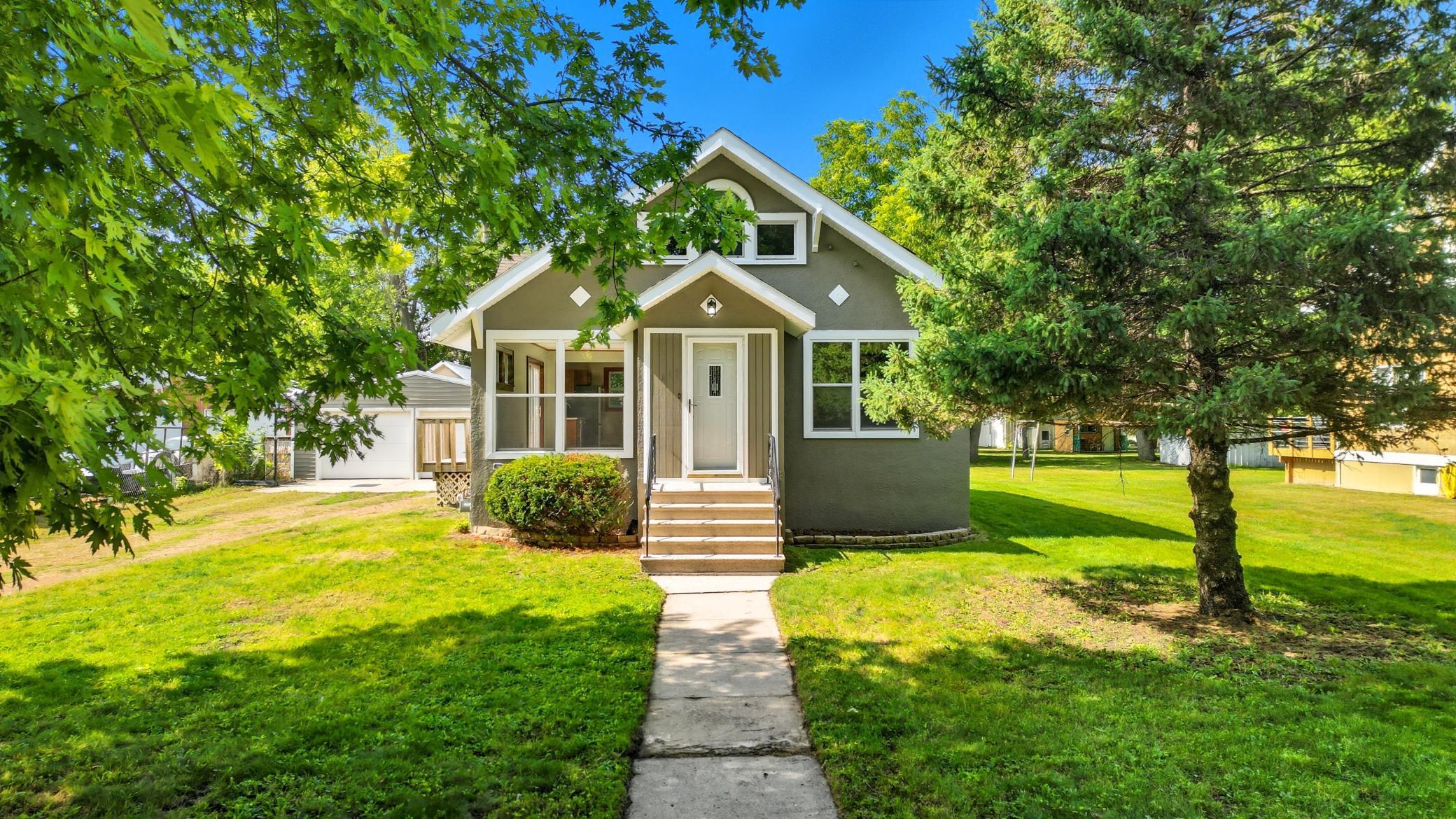 This 3-bedroom, 2-bath home blends character with a long list of recent updates. The main floor offers two bedrooms, a full bath, and an open living–dining space that flows into the refreshed kitchen. Upstairs you’ll find a large third bedroom with a distinctive window feature.

Notable improvements include central air, new flooring throughout much of the home, a partial roof replacement, updated plumbing, all-new lighting and ceiling work, stainless-steel appliances, and a kitchen opened up for better flow. The property also includes a two-stall garage plus a welcoming front foyer entry and a good-sized yard.

Move-in-ready updates plus classic curb appeal make this property easy to picture as your next home.