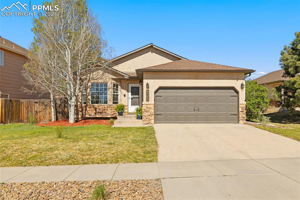 This beautifully remodeled ranch-style home is set on a gorgeous lot filled with mature aspens and trees. The open-concept design offers true main-level living, with luxury plank flooring throughout the main level and soaring vaulted ceilings that create a bright, open, and airy feel.The updated kitchen features granite countertops, stainless steel appliances, a stylish backsplash, a dedicated coffee area, and an extended buffet in the eat-in nook for added storage and prep space. The dining area is highlighted by a charming bay window that fills the space with natural light.The main-level primary suite offers a peaceful retreat with a spacious walk-in closet complete with custom built-ins and a private en-suite bath featuring double vanities, linen storage, and an additional separate closet.The fully finished basement provides even more living space with a large rec room, dedicated game area with a pool table, full bathroom, and two additional bedrooms, ideal for guests or flexible living needs. Outside, the expansive backyard is designed for both relaxation and entertaining, featuring an extended stamped concrete patio, floating composite deck, artificial turf, charming gazebo area, shed with electrical, and a water feature. The oversized garage also includes an electric charger.Don't miss your chance to see this beautiful home. Schedule your showing today!