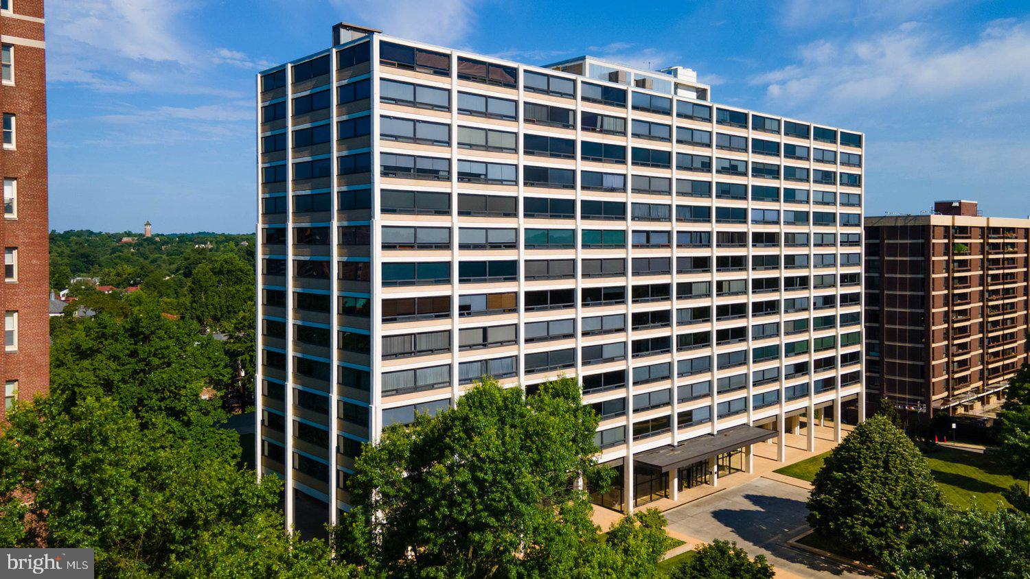 Mies van der Rohe's Highfield House, designed "to create a visually unobstructed feeling of openness and space..." Sweeping easterly views from this charming condominium's full wall of windows.  Impressively proportioned with over 900 square feet, this one-bedroom unit features a beautifully renovated kitchen, wood floors in the main living areas and ample closet space.  Monthly condo fee includes heat, central AC, cooking gas, water and hot water, pool and 24-hour front desk. Convenient to Johns Hopkins University, Penn Station, Union Memorial Hospital and more!  Live in Art!View Tours for interactive walkthrough.