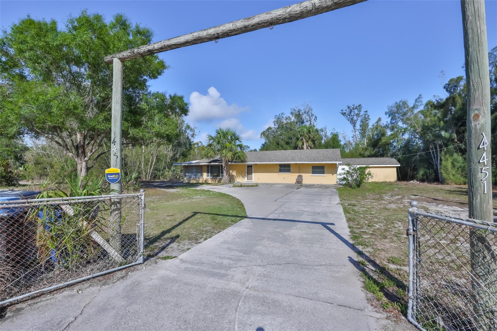 Discover the possibilities of country living, working from home and owning 7.25 acres of versatile agricultural property in Manatee County with a Wimauma address. This unique property features a 3-bedroom, 2-bath block home, a 6,000 square foot greenhouse/multi-purpose building, multiple wells, a natural spring-fed pond, a large workshop, and A (General Agriculture) zoning, offering an exceptional combination of land, infrastructure and flexibility for a variety of current and future uses. Immediate income potential exists for a buyer who chooses to continue the existing exotic tropical fish business. The versatile greenhouse and fully fenced acreage could also be adapted for a plant nursery, agricultural operation, storage for an automobile collection, hobby farm, horse property or space for growing fruit trees and vegetables. The possibilities are extensive and provide an opportunity to create a property tailored to your interests and goals. Located in an X flood zone, flood insurance is not required and there are no HOA or CDD fees. The home features an updated kitchen (2020), office/den, new roof (2022), leaf guard gutters (2025), new septic drain field and lift station (2020) and an inside laundry room with washer and dryer. French doors with blinds between the glass open to a large, newly screened lanai. Additional features include a covered outdoor storage area and an adjacent detached workshop/storage building. One of the property's most distinctive features is the 6,000 square foot greenhouse/multi-purpose building, consisting of a 2,000 square foot shop/storage area and a heated 4,000 square foot production area. The existing setup is well suited for aquaculture but could potentially be adapted for other agricultural, horticultural, nursery, storage or specialty uses. The acreage is supported by three wells. One deep well serves the home and includes a degasser, chlorinator and water softener. Two additional wells serve the greenhouse: a 50-foot shallow well providing acidic water and a 300-foot deep well providing hard/alkaline water. This existing water infrastructure is particularly well suited to aquaculture and other uses requiring different water characteristics. The greenhouse also includes six separate recirculation systems, six submersible pumps, an air compressor providing oxygen and aeration throughout the facility, floor drains for efficient maintenance and a Ryobi gasoline-powered backup generator to help maintain operations during power outages. A 2008 Yamaha gasoline-powered golf cart is included, making it easy to navigate the acreage and access the greenhouse. The natural spring-fed pond adds to the property's beauty and functionality. Whether your vision is to continue the existing aquaculture business, establish a new agricultural or specialty operation, create a hobby farm, develop a plant nursery, grow your own fruits and vegetables, keep horses or other permitted farm animals, store a vehicle collection or simply enjoy the space and privacy of 7.25 acres, this property offers a rare combination of land, improvements, and future possibilities. Call for additional details. Some home photos have been enhanced.