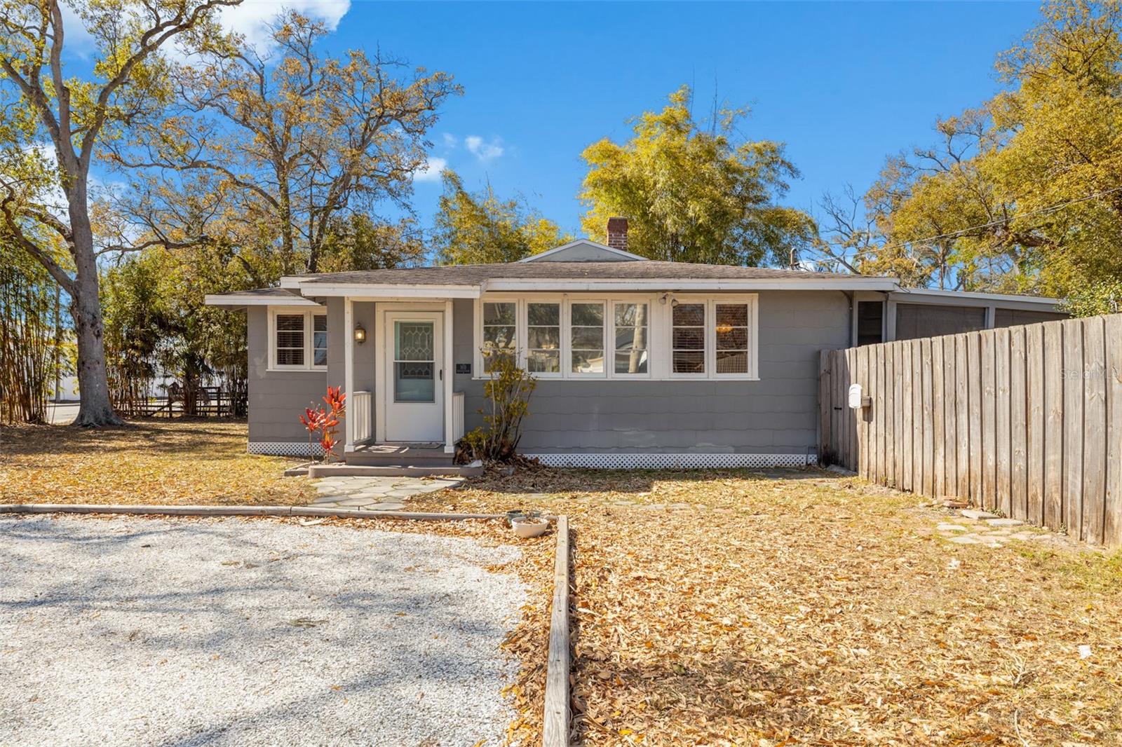 Situated on a generous .3185-acre corner lot, this 3-bedroom, 1.5-bath property is full of character, featuring beautiful original wood floors throughout and large living room windows that fill the space with natural light. Roof replaced in April 2016, HVAC (2016), water heater (2017), electrical fully rewired in 2017, new rear bedroom windows installed in 2021, and in 2025 a massive 3-car garage was added — a $50,000 value. This home offers major system updates and infrastructure improvements that provide real peace of mind. The flexible layout and oversized lot incredible potential, while the huge fenced backyard provides ample room for boat or RV parking, outdoor gatherings, future expansion, or even a pool. Whether you're an investor seeking solid fundamentals and long-term upside, or a buyer ready to personalize a home with charm and space, this property delivers versatility and value. Conveniently located in the heart of Pinellas Park with easy access to US-19, Park Blvd, and I-275, you’re just minutes from St. Petersburg, Tampa, area beaches, shopping, dining, and local parks.