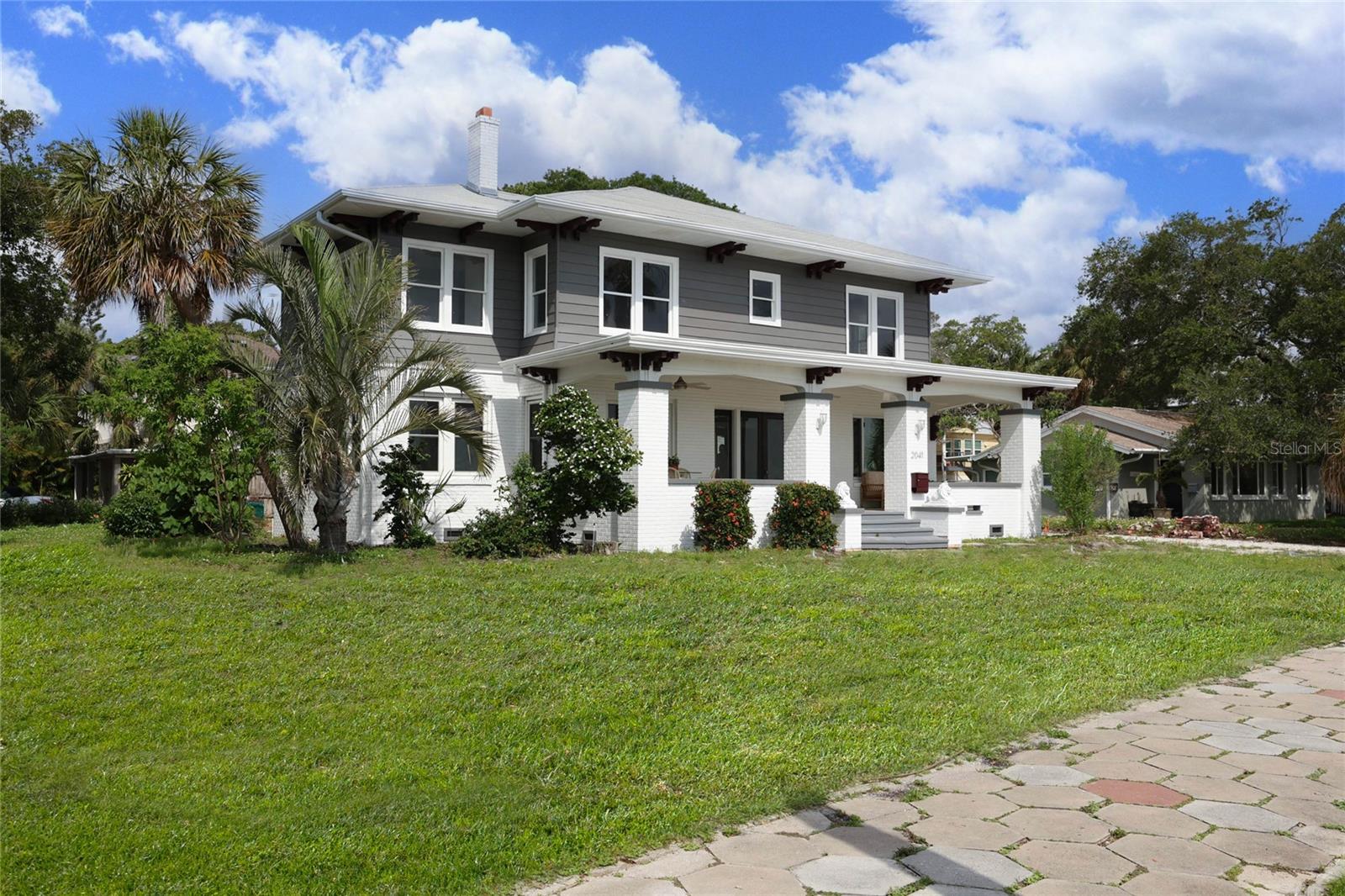 ***MOTIVATED SELLER*** Also available for lease at $17,500 per month.*** or LEASE OPTION or  SELLER FINANCE around $1.5 million available with negotiable terms. Welcome home to this stunning 4-bedroom home with 3 1/2 baths and a 2-car garage that underwent a complete renovation in 2022 and 2023. The home is positioned on a double lot site, overlooking Lasing Park and Tampa Bay. Beach Drive in Old Southeast is one of the most sought-after bay views in all of Tampa Bay. You can enjoy the magnificent sunrise every morning from the open porch and views from many rooms of the home. On weekends, boats pull up to the nearby sandbar, allowing the crew to frolic in the surf, and you can watch countless kite surfers racing by, taking advantage of the wonderful bay breeze. The home has been fully restored to its original 1920s glory with updated features. The house underwent a year-long, detailed historic renovation down to the studs. ***NO FLOOD ZONE AND NO FLOODING FROM MILTON OR HELENE*** It has new electrical wiring, new plumbing, two new AC units, new windows at ground level, a new kitchen, and new bathrooms. The kitchen is adorned with Bosch appliances and backlit Onyx countertops, including an island with a waterfall edge. Quality shaker-style, all-wood, soft-close cabinets were installed throughout the home. The kitchen floor and bathroom wall and floor coverings are natural stone. The original wood floors were restored by a master craftsman. Countless hours were spent locating period-correct chandeliers and light fixtures, adding to the home's character. Additionally, there are solid wood closets throughout completed by a master woodworker. The back bedroom of the home includes a suite with a kitchenette and a private bathroom. This suite can be isolated from the main home for use by out-of-town guests or can be leased. Call to schedule a private showing today!