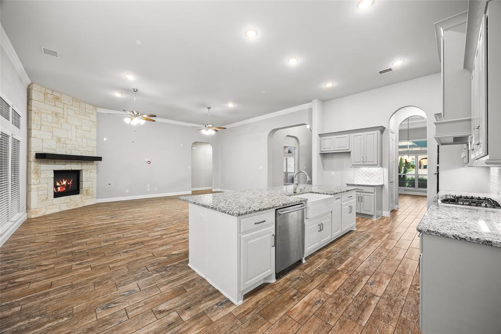 Welcome to the best of country living—just minutes from the city. Nestled on 1.19 acres in sought-after Parker Ranch Estates and zoned to top-rated Allen ISD, this south facing move-in ready one-story offers the space, privacy, and modern comfort you've been searching for. With no west side neighbor, you’ll enjoy unobstructed views of breathtaking Texas sunsets every evening.
Inside, enjoy 4 spacious bedrooms, 3.5 baths, a private office, game room, and a fully outfitted media room—designed for everyday comfort and next-level entertaining. The media room includes a 136inch screen, Epson projector, Denon receiver, and 7.1 surround system with two pass-through speakers built behind the screen and 6 in-wall speakers. Prewired whole-home audio extends to the kitchen, living room, primary suite and bath, and outdoor patio—ready for your soundtrack of choice.
The open-concept living space is anchored by luxurious wood-look tile and a chef’s kitchen featuring an 11-foot island, granite countertops, stainless steel appliances, and generous cabinetry—perfect for entertaining or everyday family life.
The primary suite is a true retreat, offering a spa ensuite bath including a walk thru double shower and oversized closet, while secondary bedrooms ready for kids, grandkids, family guest.  
Step outside to your extended covered patio with fireplace, dual pergolas, and endless space for future pool dreams or serene stargazing.
This smart home is packed with upgrades: CAT 6 wiring, a hardwired security system with cameras plus 5 wireless cameras, smart thermostats, garage doors, locks, and a 3-car garage prewired for a 220V EV charger. Energy-efficient features include a tankless gas water heater and high-efficiency HVAC.
Whether you’re a growing family or an empty nester craving space and sunsets, this Parker gem delivers.The sunsets are free. The lifestyle is priceless.