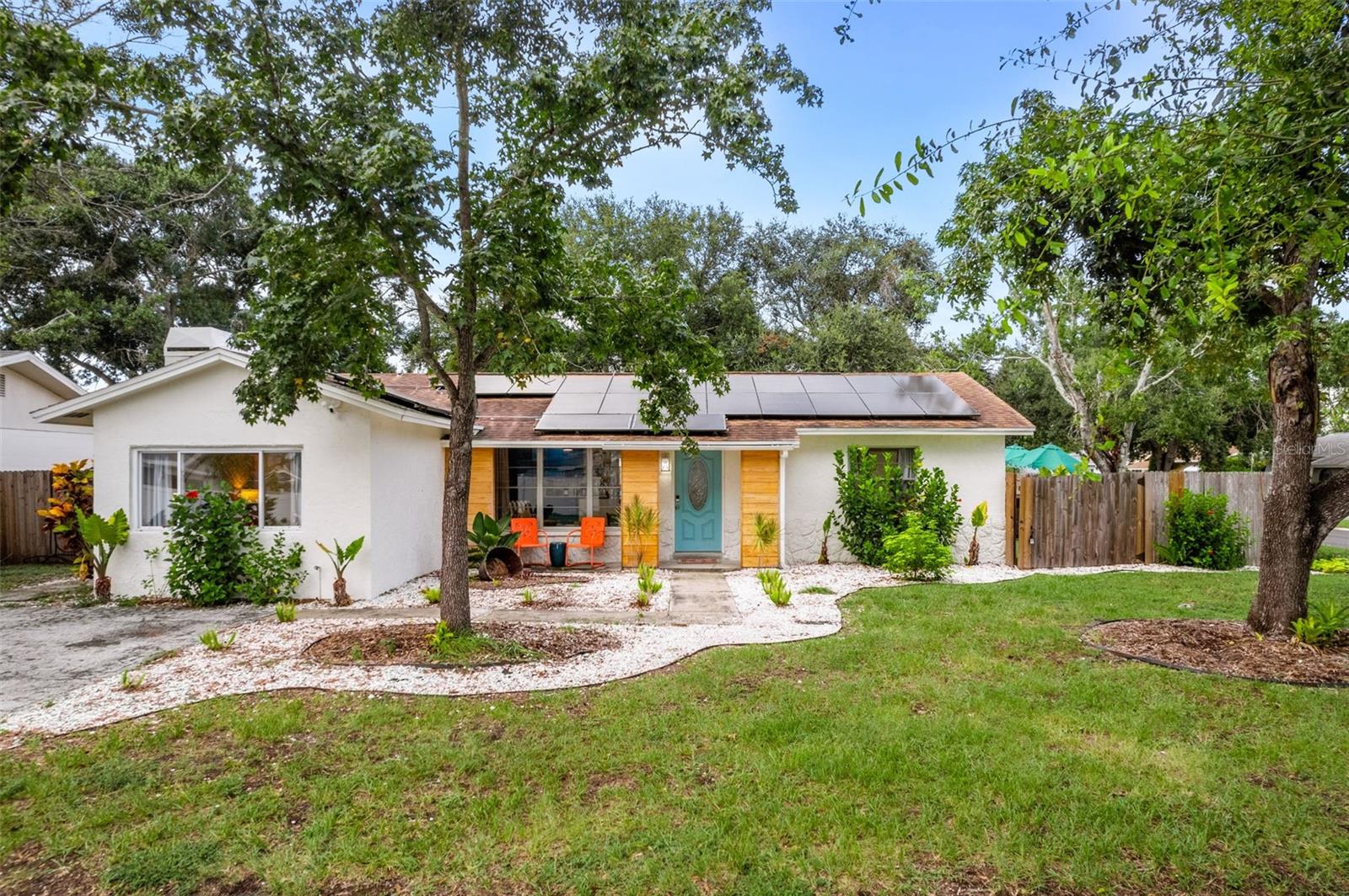 Welcome to your next investment opportunity—or your own private Florida retreat. This professionally designed, fully furnished home is being offered turnkey and has been thoughtfully curated for the short-term rental market, allowing the next owner to step into an already established vacation rental with documented Airbnb performance and booking history available. Inside, you'll find bright coastal finishes, spacious living areas, and designer furnishings that create an inviting experience for guests and homeowners alike. Every room has been intentionally designed to maximize comfort, functionality, and rental appeal. The backyard is where this property truly shines. Featuring a newly resurfaced pool, covered tiki bar, multiple entertaining areas, and a true resort-style atmosphere, it's easy to see why guests love staying here. Whether relaxing poolside, enjoying dinner outdoors, or spending evenings under the Florida sky, this home delivers the vacation lifestyle buyers are looking for. Located just a 15 minute drive to the beach, and close to shopping, dining, golf, parks, and both Tampa International and St. Pete-Clearwater airports, the location offers easy access to everything that makes Pinellas County one of Florida's most desirable destinations.Whether you're looking for a personal vacation home, a second residence, or an established income-producing investment, this property offers a rare opportunity to own a truly turnkey Florida getaway!!