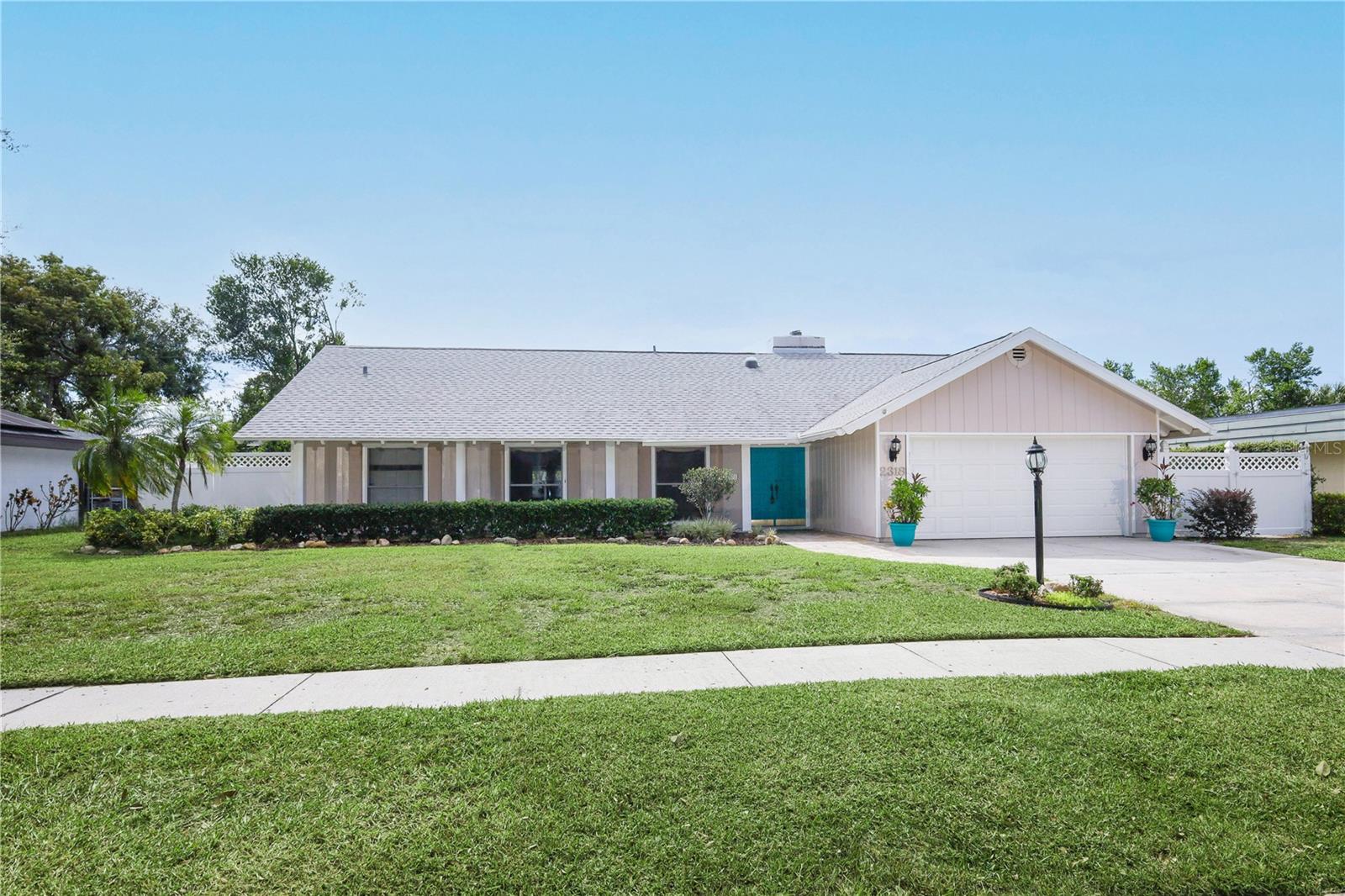 One or more photo(s) has been virtually staged. You know it is your house as you walk on your brick pavers to your front porch. As you enter the wide double doors they beckon you inside. This is your  Rutenberg style floorplan home which is designed for both comfort and style.
Heart of the Home: The Kitchen is at the center of the home and has been thoughtfully updated with solid wood cabinets, a functional working island, ample drawer space, and a spacious pantry. The cozy eat-in nook overlooks your brick paver-surrounded, screened-in pool, creating a perfect spot for morning coffee or casual meals.
Living Spaces: The family room opens easily, featuring a charming brick fireplace with an electric crackle for ambiance. Three additional bedrooms are thoughtfully arranged, including a pool-planned bathroom and a secondary ensuite bath for guests or family.
Formal Living & Dining An L-shaped formal living and dining room divides the home, offering elegant spaces for entertaining or relaxing.
Primary Suite Retreat The updated primary suite is a true retreat, featuring a private water closet, step-in shower, double sinks, and double closets. Wide doors throughout make movement easy and accessible.
Convenience & Extras Laundry facilities are conveniently located on the way to the two-car garage, where you’ll also find a carbonated water filter just outside the door for fresh, sparkling water.
Outdoor Living For those who love the outdoors, the large cobblestone deck wraps around the screened-in pool, providing plenty of space for entertaining year-round. There’s a fire pit in the backyard to enjoy. We are proud to offer reality staging and reality renovations with stage, style & design by dakini.