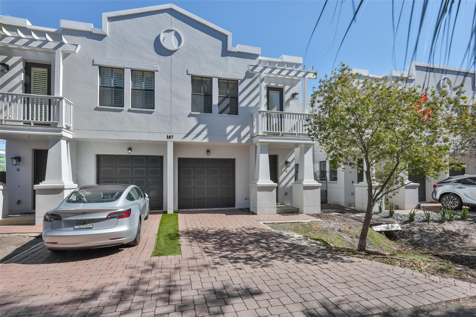 Live the Hyde Park Lifestyle in this stylish end-unit townhome with a private fenced yard, 1-car garage + driveway, and low HOA of just $225/month. Perfect for an owner-occupant, investor, or AirBnB opportunity.This 2 Bedroom, 2.5 Bath home features 10-ft ceilings, crown molding, engineered hardwoods. The open great room flows into a large upgraded kitchen with granite countertops, stainless steel appliances, tile backsplash, and dishwasher, ideal for entertaining.Glass sliders open to your private fenced area, perfect for pets and BBQs. Upstairs offers a versatile office spot and laundry closet with washer & dryer included.The spacious primary suite includes a cozy sitting area, Juliet balcony, dual vanity, separate shower and tub, and a huge 9' x 7' walk-in closet. The secondary bedroom is privately located with its own attached full bath.Additional highlights: new fencing, freshly painted exterior, attached garage, not in a flood zone, and an affordable low HOA. Walk to Hyde Park Village, Bayshore Blvd, restaurants, coffee shops, nightlife, and Cine Bistro. Just a few minutes to Downtown Tampa, Armature Works, Riverwalk, Julian B. Lane Park, and Davis Islands.Walkable. Stylish. Prime Hyde Park living.