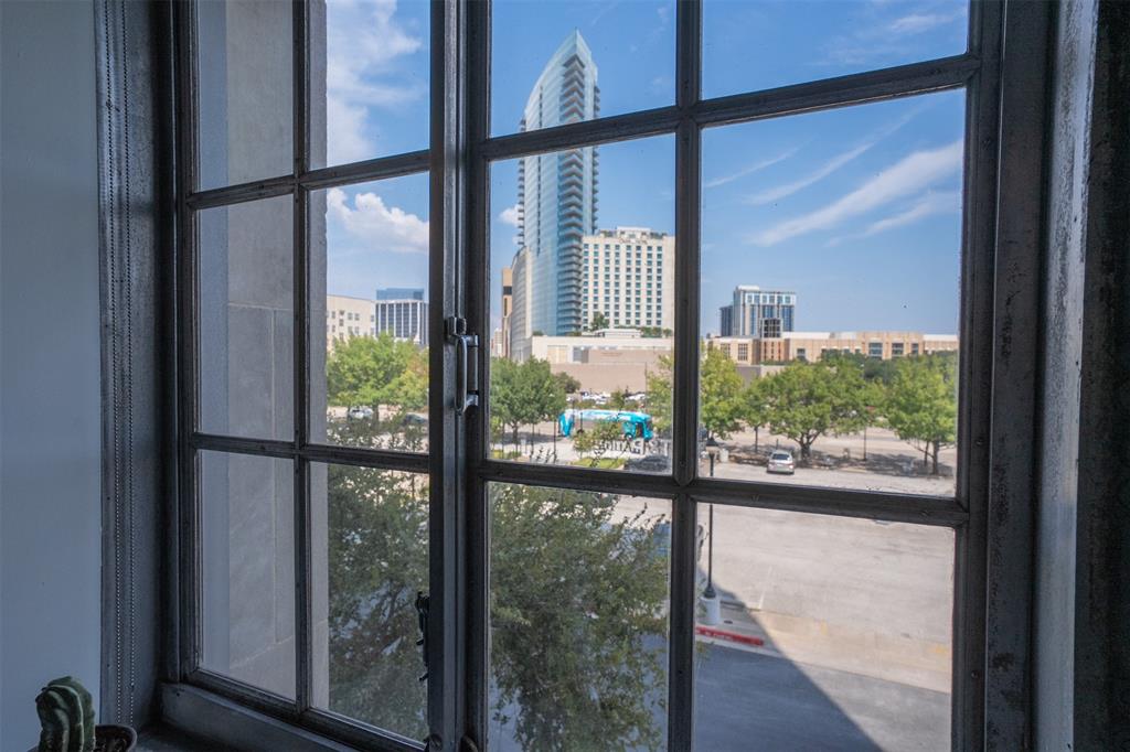 One of the most unique condos in the historic 1931 T&P Station. Enjoy a stunning downtown view through the vintage pewter-framed windows. Polished terrazzo floors and fully updated kitchen and bathrooms make this a home like no other in downtown Fort Worth. 
Quiet location on the 2nd floor with only 2 other units. This condo includes 2 reserved parking spaces in the gated 1st floor garage, only steps from your door. A 3rd adjacent parking spot is available for sale along with this condo if desired. Lots of storage with a custom closet system AND a secure storage unit downstairs, ideal for bikes or holiday decorations. 
The community amenities include 3 landscaped courtyards with propane grills, a dog park, fitness center, resistance pool, media room, owner’s lounge, covered patio, and 24 hour full-service professional concierge.
The adjoining Trinity Metro Station provides easy access to downtown Dallas via the TRE, or to DFW Airport Terminal B via TexRail. 
Just a short walk to surrounding entertainment districts; Sundance Square and South Main Village. Hop on TexRail to enjoy an evening in the  Fort Worth Stockyards or historic Grapevine Main Street without searching for a parking spot.