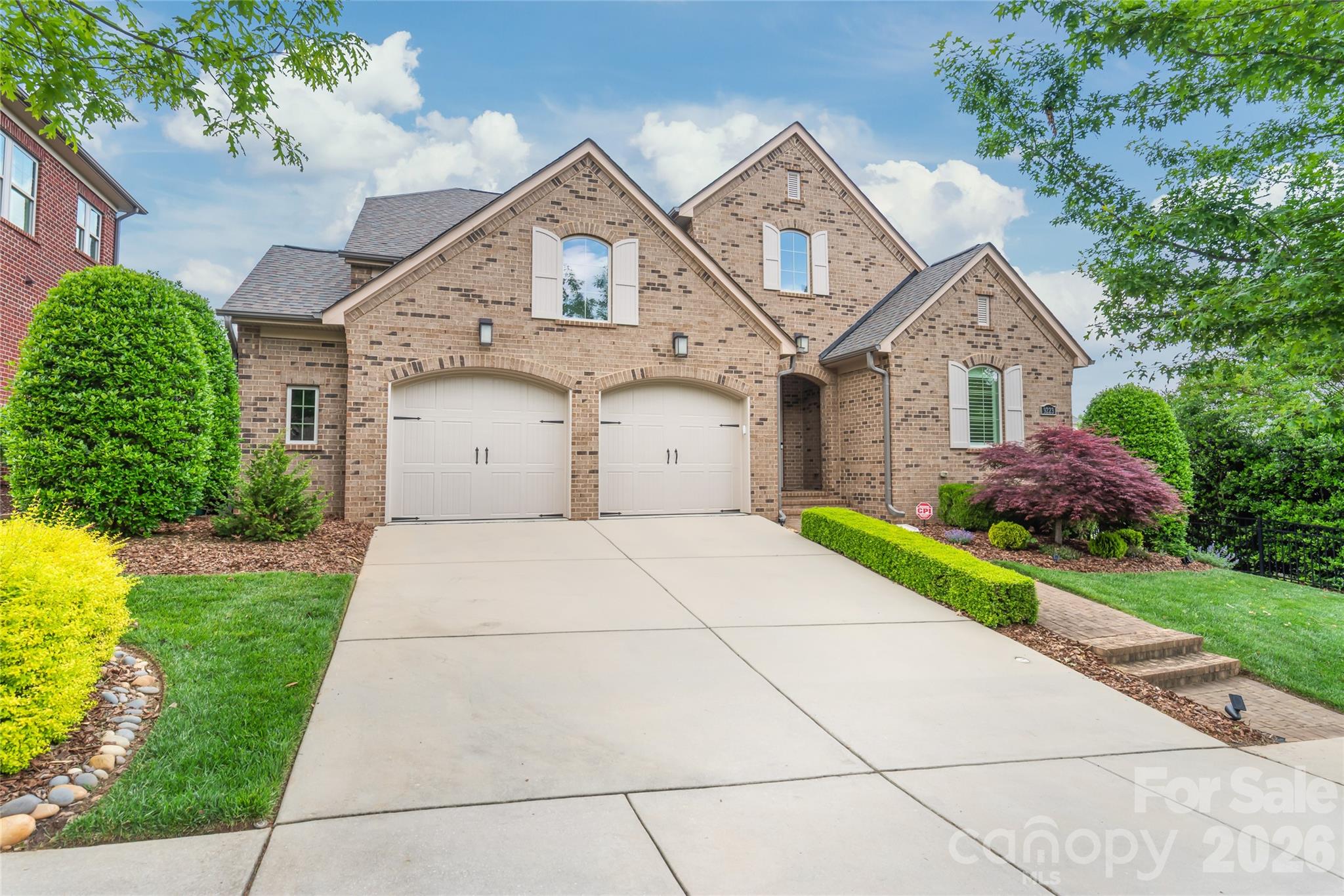 Be sure to check out this immaculate, full-brick home in the highly coveted Robbins Park neighborhood. This is a special property that exudes pride of ownership! Terrific, open floor plan, with the first story featuring 3 bedrooms - including the primary suite as well as 2 additional bedrooms. Upstairs you'll find an inviting flex-space / bonus room area, plus another bedroom & full bath. Move-in ready: the house has been exceptionally well cared for. The interior was recently completely re-painted, using neutral colors - without a bunch of nail holes for the next owners to patch. Gourmet kitchen, plantation shutters and gleaming hardwoods on the main level. Upgraded bathrooms include tiled tub / shower walls and beautiful countertops. The outdoor space features a screened-in porch and brick patio overlooking a fenced and private backyard with terrific landscaping! Full-yard irrigation. Recent additions include a new epoxy floor in the garage, as well as a whole-house water filtration system. New hot water heater and HVAC coil recently replaced. This feels like a new home - but with mature landscaping and in an established neighborhood! Robbins Park offers a pool, parks/green spaces, walking trails, tennis/pickle ball courts, volleyball court and soccer fields. A quick drive or walk to Lake Norman and Birkdale Village. Close to other shopping areas, dining options, the new Atrium Hospital and I-77.