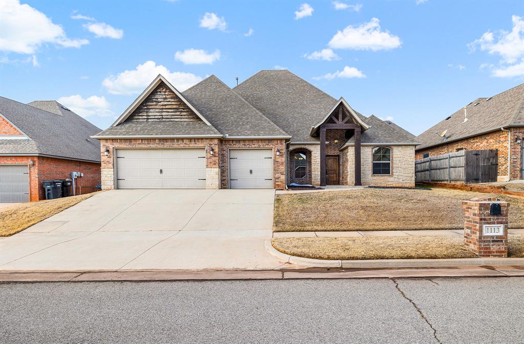 This immaculate 2,800+ sq ft home offers you everything you could want. The open concept first floor presents you with a dedicated formal dining space, a gas fireplace, high end cabinetry and custom vent hood over the brand new gas range, new dishwasher and ovens, large island, walk-in pantry, and high-end fixtures, not to mention the hardwoods throughout & tons of natural light! The downstairs primary is spacious with tall ceilings, as well as a massive ensuite with a walk-in shower and jetted soaker tub. The remaining bedrooms are all generously sized with large closets. The mud room & laundry space has ample cabinetry, countertop space, and has plumbing ready for a sink to be installed! Upstairs you have a large space that could be used as a 4th bedroom, office, media room, or flex/bonus space. The upstairs area also has an attached full bathroom and closet. The oversized 3-car garage has a built-in storm shelter. The backyard has a large covered patio area and has a gas line ready to hook up your grill! This home is what you've been waiting for...schedule your private showing before it's too late!