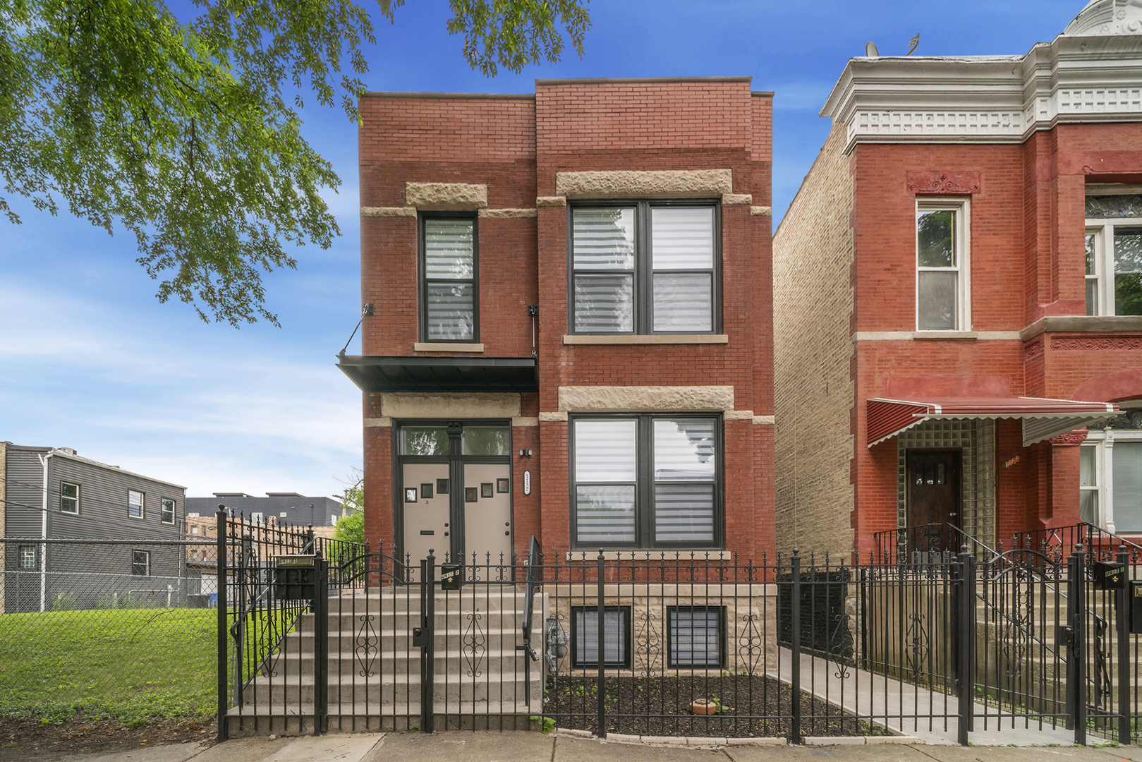 Be the first to live in this completely remolded 2 bed 2 bath Humboldt Park apartment! This Second floor apartment gets great light, with windows in each room.  Big windows in the spacious living room provide ample natural light and make this a  great space to entertain friends and family. There is even a nook for a comfortable work-from-home space. The stylish wall paneling adds a designer touch to the space and allows for wall mounting of a TV.  One bedroom features a convenient en-suite bathroom complete with vanity sink, tile flooring, and tile surround walk in shower.  The fully updated kitchen, provides you with ample cabinet space, designer butcher block counter tops, and brand new stainless steel appliance including Dishwasher, Gas stove, Microwave and side by side Fridge/freezer. Designated space off the kitchen is perfect for a dining table or extra work from home set up. Second Full bathroom features, vanity sink, tile flooring, and stone surround shower/tub combo. IN UNIT W/D makes laundry a breeze! Each unit has their own back deck/ patio and access to the shared backyard. Garage parking spot available while spots last, otherwise super easy street parking. Great location, off of Division, close to bars, restaurants, grocery stores and Gorgeous Humboldt Park!