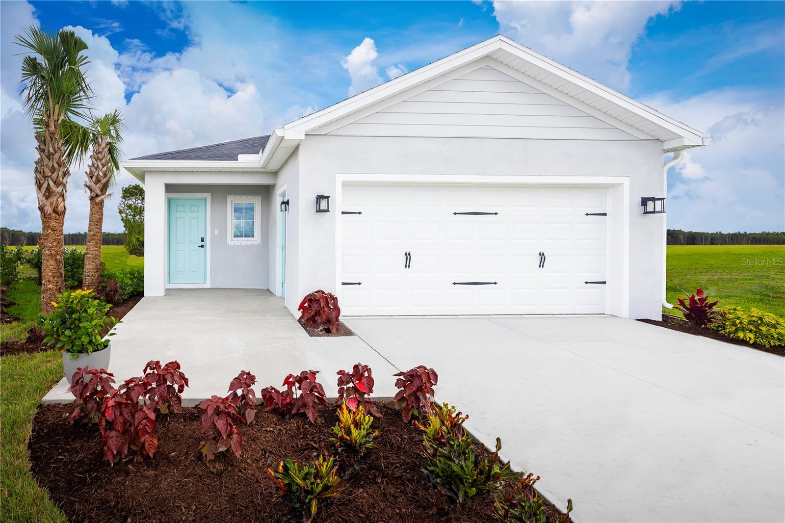 Move in Ready! Welcome to Emerald Fields, a new home community bringing low-maintenance living, exceptional value, and no CDD fees to Hudson, Florida. The Coral single-family home was made for main-level living. A convenient 2-car garage leads through the laundry room into the wide-open floor plan. Here, a formal dining space overlooks the gourmet kitchen. Friends will sit at the extra-large center island as you cook up a culinary masterpiece. Two spacious bedrooms and a full bath provide privacy and comfort, while your stunning owner’s suite offers endless style, with its huge walk-in closet and double vanities. Come see why The Coral is the complete package. All Ryan Homes now include WIFI-enabled garage opener and Ecobee thermostat. **Closing cost assistance is available with use of Builder’s affiliated lender**. DISCLAIMER: Prices, financing, promotion, and offers subject to change without notice. Offer valid on new sales only. See Community Sales and Marketing Representative for details. Promotions cannot be combined with any other offer. All uploaded photos are stock photos of this floor plan.