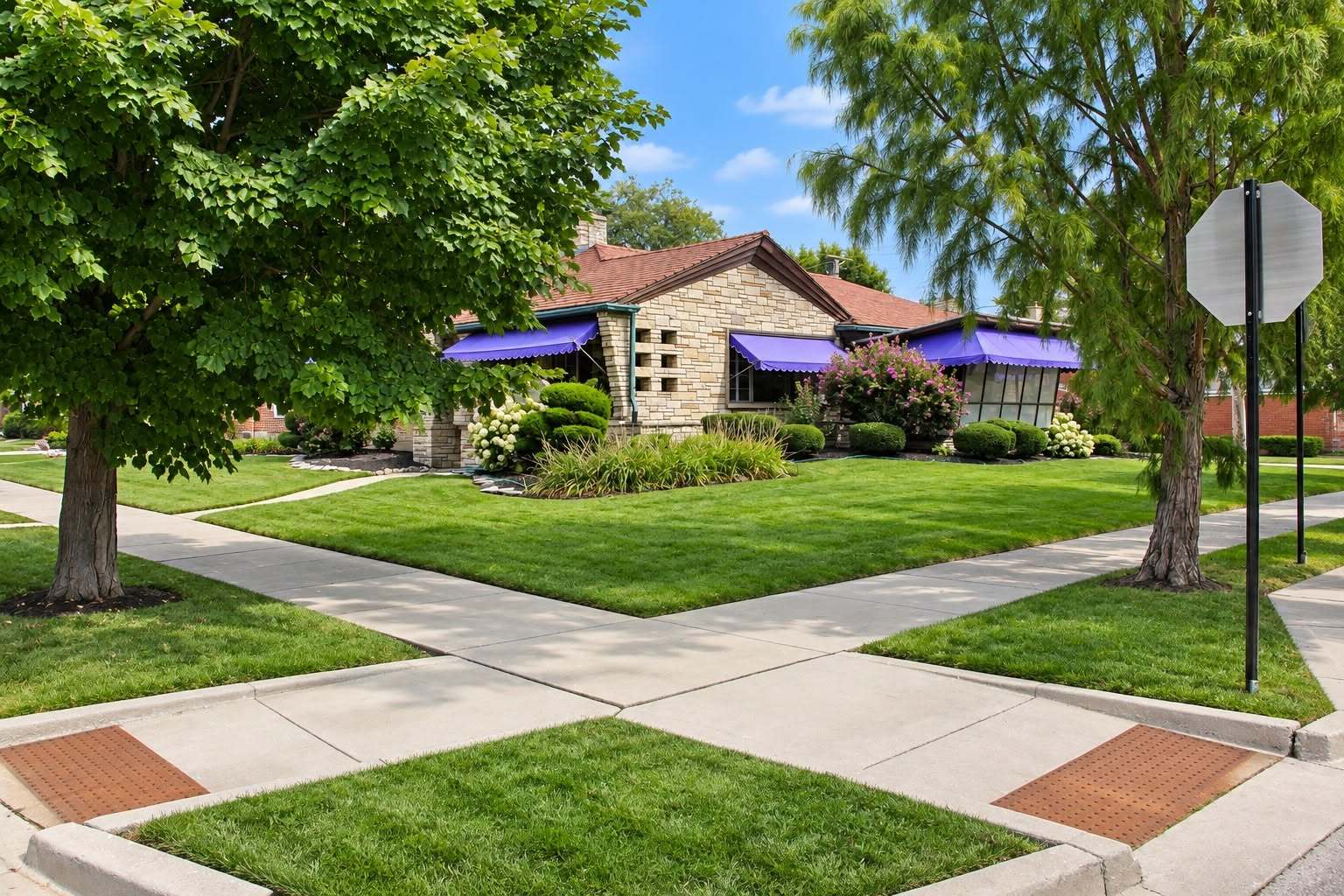 TIMELESS ARCHITECTURE. EXCEPTIONAL SPACE. NORTH BEVERLY LIVING!    A one-of-a-kind custom residence designed by renowned architect Elmer Carlson. Situated on an expansive double corner lot, this architectural gem showcases Roman brick, a classic tile roof, radiant floor heating, and approximately 3,625 square feet of living space.    Inside, discover oversized picture windows, custom built-ins, a formal dining room, an eat-in kitchen, and a spectacular primary suite featuring a marble wood-burning fireplace, private dressing room, and spa-like bath with a seven-head shower.    THE SHOWSTOPPER? An incredible 40'  22' great room featuring pecky cypress walls, a floor-to-ceiling stone fireplace, and a full wet bar with seating for eight!    Enjoy a three-season sunroom with a new roof, three fireplaces throughout the home, an oversized heated two-car garage with an additional tool room on the opposite side, and driveway parking for approximately eight vehicles. Beautiful landscaping, perennial hydrangeas, and an underground copper sprinkler system ready for your personal touch complete this exceptional property.    LOCATION IS EVERYTHING! Walk to Metra, restaurants, and shopping, with Beverly Country Club and Beverly Hills Tennis Club nearby.    Exceptional architecture, incredible entertaining spaces, and an unbeatable North Beverly location-this is a home you have to experience in person!