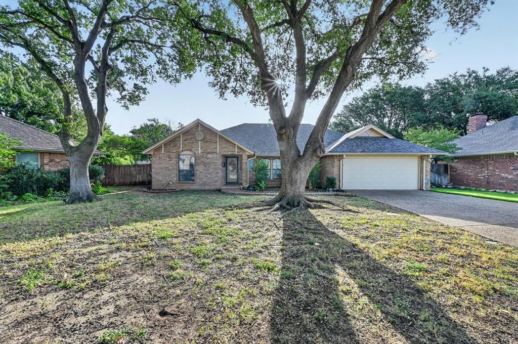 Situated on a quiet cul-de-sac in Brandingshire Place, this well-maintained 4-bedroom, 2-bath ranch home offers 2,014 square feet of living. The living room serves as the natural centerpiece of the home, featuring a vaulted ceiling and a wood-burning brick fireplace. The eat-in kitchen is finished with granite countertops and ample pantry storage, and flows into a dedicated dining area suited for both daily living and entertaining. The primary suite offers a private retreat with an ensuite bath, dual sinks, a jetted tub, a separate shower, and a walk-in closet. Three additional bedrooms provide flexibility for family, guests, or a home office. Bay windows and skylights bring in abundant natural light throughout the home. Outdoor living is well-suited for relaxing or hosting, with a covered rear patio, fenced backyard, and a storage shed.