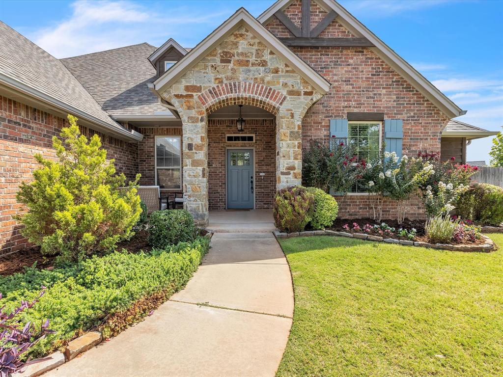 This beautifully designed true 5-bedroom, 4-bathroom home offers over 3,100 square feet of functional and stylish living space on nearly half an acre.

Built in 2015, the home features an open layout filled with natural light, a spacious living area with a cozy fireplace, and seamless flow between the kitchen, dining, and living spaces—perfect for both everyday living and entertaining. A brick accent wall adds charm to the dining room, and a coffered ceiling in the entryway and wainscoting create a striking first impression.

The private primary suite features a spacious en-suite bathroom and a walk-in closet with built-in storage, as well as direct access to the laundry room, providing added convenience. Three additional bedrooms and two full baths are located on the main floor. Upstairs, a fifth bedroom with its own en-suite bath offers the perfect space for guests, a teen suite, or multi-generational living.

A dedicated home office with built-in bookshelves and large windows provides a bright and inspiring space to work from home.

Outdoors, enjoy a large backyard with a covered patio, fire-pit, and a private basketball court. The 3-car garage includes an in-ground storm shelter for safety and peace of mind.

Located in the top-rated Edmond School District and close to shopping, dining, and major highways, this home offers comfort, flexibility, and standout features in a prime Edmond location.