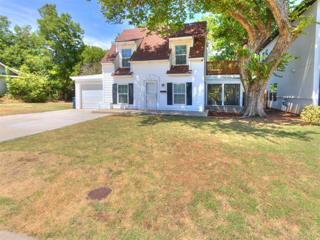 Location, Location, Location! Set in the Helm Farm neighborhood it's only a short walk to the Western Ave Entertainment District with loads of dining and shopping options. Plus it's just minutes to Classen Curve, the Paseo Arts District, and downtown OKC!  Enter into the orignal living area with its cozy decorative fireplace that's open to the nicely sized kitchen with its abundant counter and cabinet spaces. The home opens up to a huge family room a half bath and large downstairs master suite. Off of the family space you can choose either to entertain on the side covered patio or the new open patio in the back! Upstairs you'll find 2 large secondary bedrooms each with space saving built-ins and one with its own private deck and a full bath.