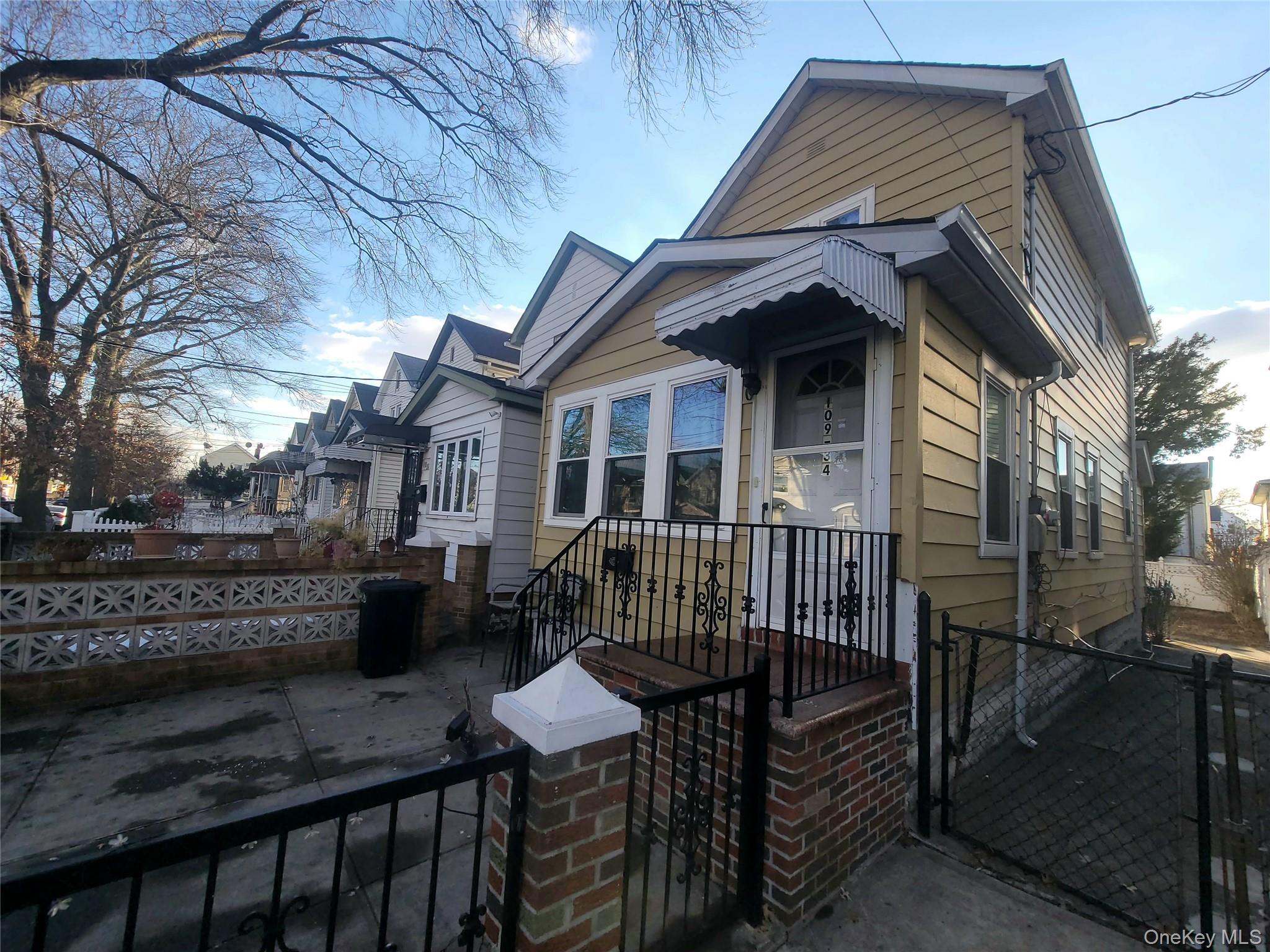 Welcome to this charming Richmond Hill residence ideally located on a quiet, residential block. This well-maintained home offers a spacious formal living room and formal dining room, perfect for everyday living and entertaining. The eat-in kitchen provides ample space for casual meals, while a convenient first-floor bedroom adds flexibility for guests or multigenerational living. The second floor features two large bedrooms offering comfortable living space. Renovated bathrooms enhance the home’s comfort and appeal. A fully finished basement provides additional living or recreational space. Enjoy a large backyard ideal for outdoor gatherings. Close to places of worship, shopping, and public transportation, this home offers both comfort and convenience in a sought-after neighborhood.