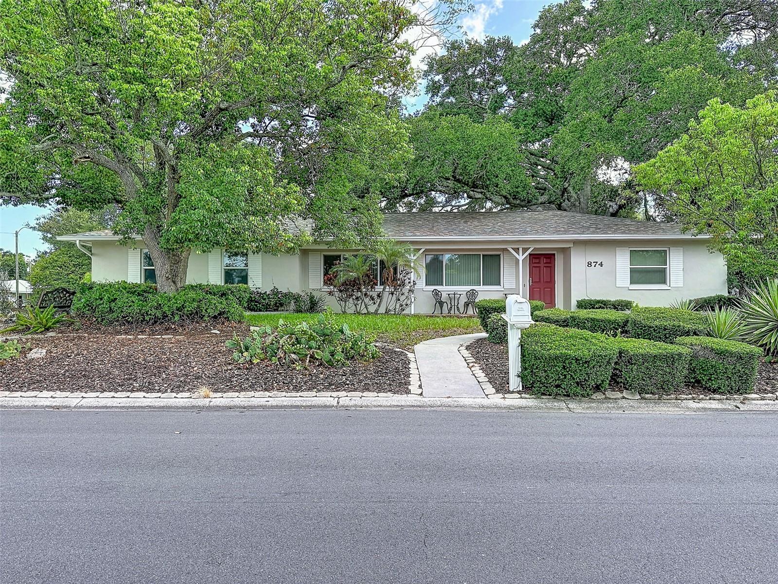 Under contract-accepting backup offers. Welcome to this exceptional residence located in one of Dunedin's most desirable neighborhoods, just minutes from the vibrant downtown district, waterfront parks, boutique shopping, dining, and all the charm that has made Dunedin one of Florida's premier golf cart communities.Ideally situated on a desirable corner lot and located in a Non-Flood zone and Non-Evacuation zone, this solid block-constructed home offers 4 bedrooms, 3 bathrooms, and 1,663 square feet of living space, with 2,261 total square feet under roof. Designed for both comfort and functionality, the home has been thoughtfully updated. Significant improvements include a complete home re-pipe completed around 2013, full PGT Impact-Rated windows and doors for enhanced storm protection, energy efficiency, and peace of mind, a new roof installed in 2020, a new HVAC system in 2023, and new vinyl fencing 2024. Adding an additional layer of security and convenience, the property is equipped with a newer Generac 22kW whole-home generator connected to an 800-gallon buried propane tank, providing reliable backup power when needed. The split 2-car garage configuration offers excellent flexibility for vehicle storage, a workshop, hobby space, or additional storage needs. With its exceptional location, extensive updates, and impressive infrastructure, this Dunedin gem presents a rare opportunity to experience the very best of Florida living.