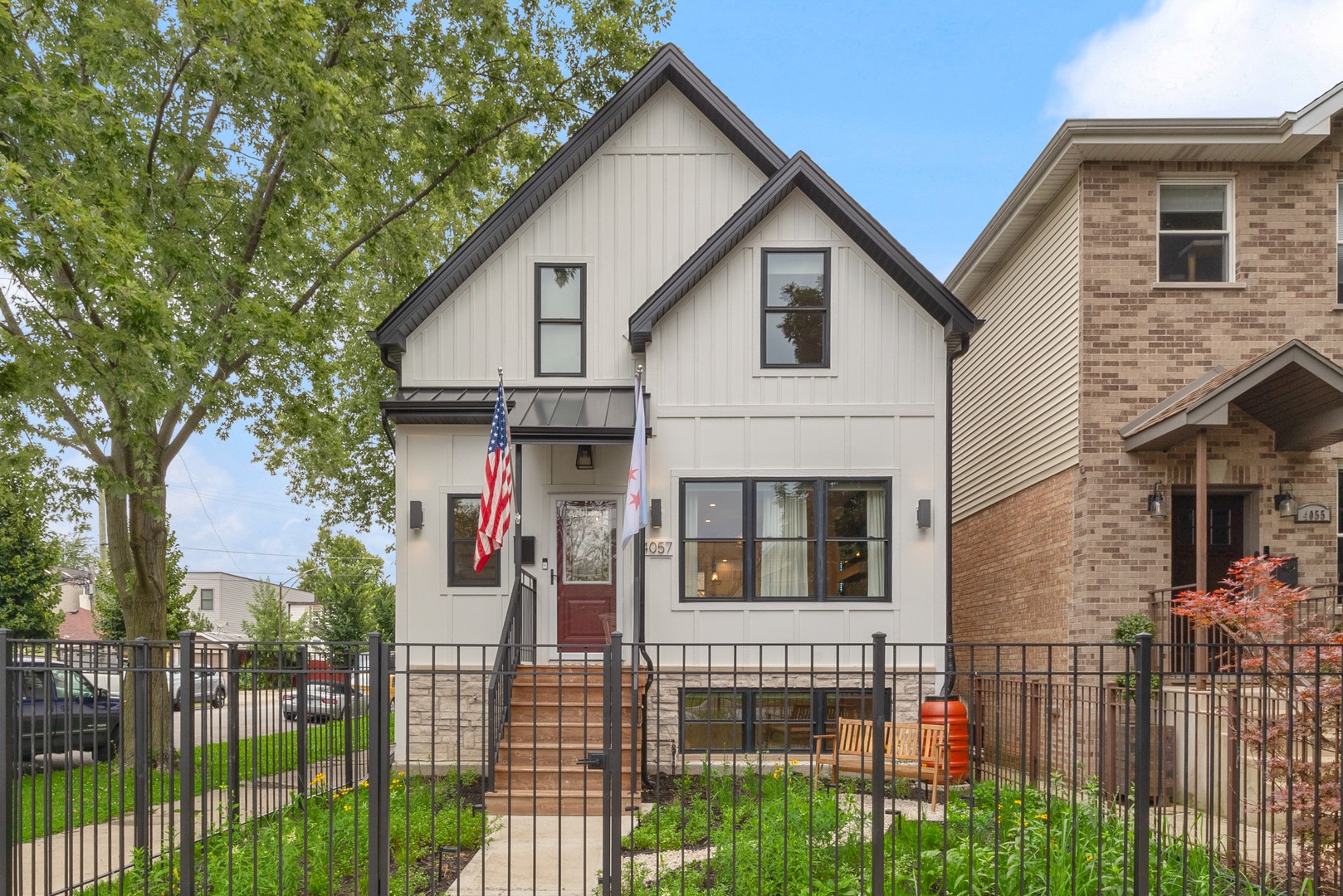 On a coveted corner lot in the desirable Irving Park neighborhood, this 4 bedroom, 3.5 bath showstopper has been completely reimagined from the ground up in 2024-and the results are nothing short of spectacular. Every inch reflects thoughtful intention and next-level luxury. From the moment you enter the property you will find a gorgeous prairie oasis that will be blooming with beautiful perennials and ornamental plantings. As you enter inside to an open-concept main floor be prepared to be impressed with the white oak hardwood floors and designer finishes throughout. The chef's kitchen stuns with 42" solid soft-close cabinetry, quartz countertops, a stylish herringbone glass backsplash, LG stainless appliances, and a massive 8' island that seats four in effortless style. Entertain with ease at your dry bar complete with floating shelves and a dual-zone wine cooler, setting the tone for unforgettable evenings. The main floor also has a powder room, what an amazing convenience! The living space glows with ambiance-featuring a custom electric fireplace, illuminated niche shelving, and a dramatic cove ceiling with integrated uplighting. The thoughtfully designed mud room opens to a covered rear deck and expansive fenced yard, creating rare indoor-outdoor flow perfect for entertaining or peaceful mornings before you start your day. Upstairs, retreat to a serene primary suite that feels like a boutique hotel with dual vanities, an oversized shower, and bold matte black fixtures. You even have your own private upper deck outdoor lounge. There are two additional bedrooms, and a full bathroom with soaking tub, offering comfort and flexibility for guests, family, or a creative work from home space.    Finally, the lower level is a vibe all its own. With a wet bar, full bath, and a custom luxury closet worthy of its own Bravo series, this level becomes a either a second entertainment area, guest suite, home theater, or ultimate executive office flex space. Every closet has been professionally outfitted, and smart blackout shades deliver sleek comfort and privacy. More storage is located within the detached garage, finished with an epoxy floor making it very easy to clean. All this is just moments from Horner Park, top dining, shopping, parks, and effortless transit. This is not just a home. It's a statement.