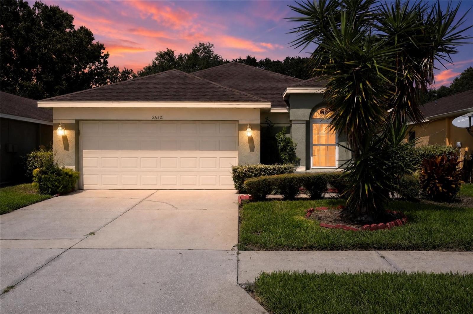 Charming 1-story home in a sought-after gated community in Zephyrhills! This 3-bedroom, 2-bath block-constructed home offers 1,924 sq. ft. of living space with a functional split floor plan, vaulted ceilings, and ceiling fans throughout. The kitchen features tile flooring, ample cabinetry, and a full appliance package. Enjoy a 2-car garage, low-maintenance lot, and the peace of mind of a gated community.Built in 2000 and located in a well-established neighborhood, this home offers a great opportunity for its next owner. Schedule your showing today!