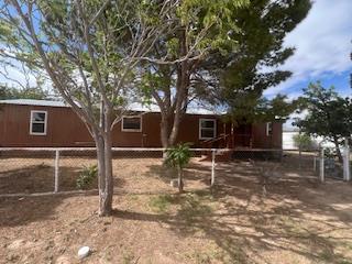 MANUFACTURED HOME IS NOT RETRO FITTED SO IT WILL GO, CONV OR CASH 2 BEDROOM 2 BATH WITH ALMOST A ACRE, 2 CAR PORT FENCED YARD ALSO RV PARKING, NEW FLOORING, NICE QUITE COUNTRY LIVING