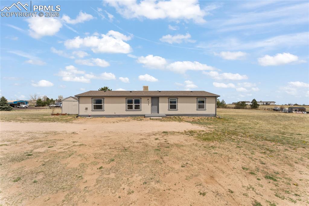 Welcome to this incredible ranch-style home in Sagecreek South, where wide open space, modern updates, and true Colorado country living come together on 2.5 acres of usable land. If you’ve been dreaming of room to breathe without sacrificing comfort, this is the one! Inside, the home has been thoughtfully updated with brand new carpet and newer luxury vinyl plank flooring, creating a clean, modern feel throughout. The kitchen has been refreshed with stainless steel appliances, including a gas range, and updated lighting that adds both style and function, perfect for everyday living or entertaining. The primary suite is a true showstopper. The fully renovated bathroom features a massive spa-style shower with dual shower heads, a new vanity, and farmhouse-inspired lighting and mirror that create a relaxing, high-end retreat you’ll look forward to every day. Step outside and the possibilities really open up. The 2.5-acre lot offers space for animals, hobbies, and outdoor living, complete with a shed and a chicken coop already in place. Whether you’re envisioning horses, goats, chickens, or simply enjoying the peace and quiet, this property is ready for your version of the farm lifestyle. With its combination of modern interior updates and wide-open land, this Sagecreek South home delivers the best of both worlds, comfort inside and freedom outside. This is Colorado living at its finest. Schedule your private showing today and start living the lifestyle you’ve been dreaming about!