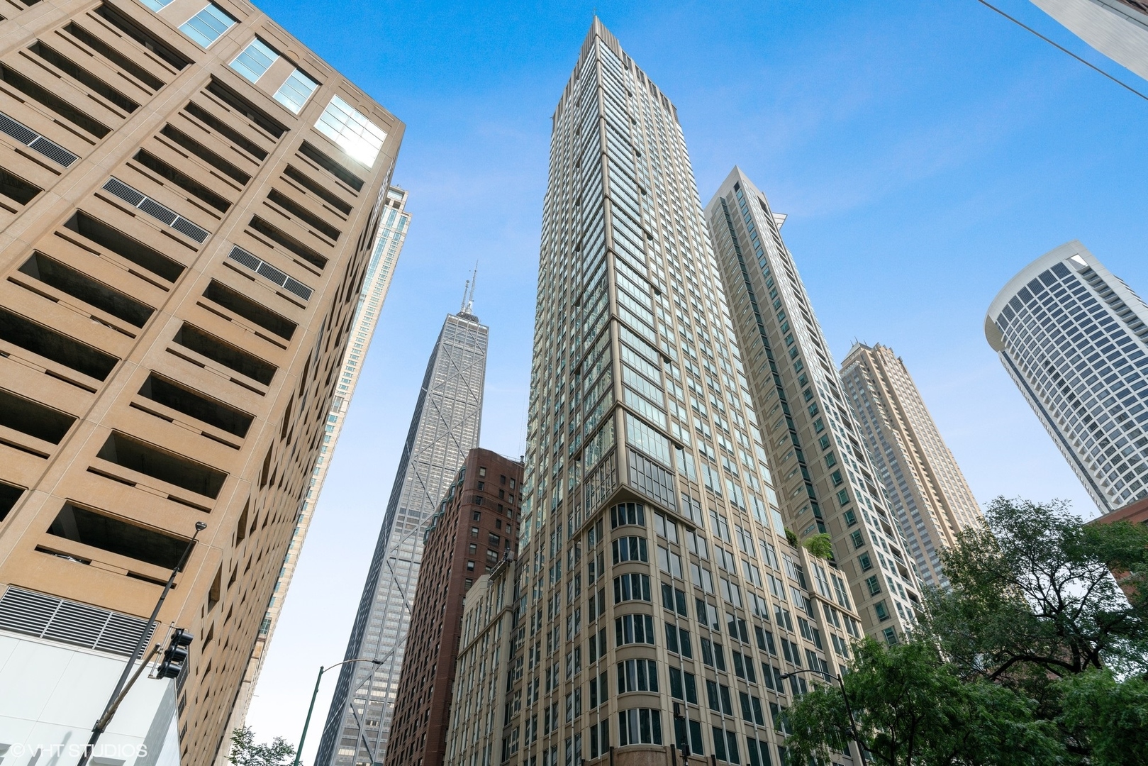 Beautiful move-in ready corner 1 Bedroom 1.5 Bath unit with fabulous skyline and lake views. Appointed with modern high end finishes throughout, including stainless steel appliances, stone counters, abundance of cabinets with an updated bathroom and powder room. Unit has sweeping views of the lake and city from floor-to-ceiling windows. Exquisite open kitchen with breakfast bar seating. Large living space with separate dining area featuring beautiful hardwood floors. Spacious bedroom with lake and skyline views featuring an organized walk-in-closet, beautiful en-suite bathroom with separate tub and shower, additional closet space and in-unit side-by-side washer and dryer. The Bristol is a first class full-amenity building with excellent door staff, package drop-off, valet cleaners, exercise room, club room, indoor pool and outdoor deck with grills and fire pit. Convenient walk to it all location with boutique shopping, entertainment and multiple fine dining options. This unit has everything you need from location, interior space, views, finishes, amenities all found within a smoke free building. Also included is an additional storage locker and prime parking space #84.