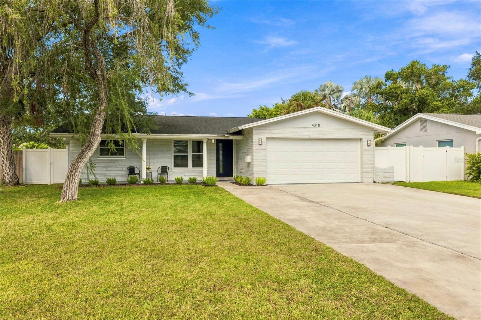 Exterior photo: Remodeled Shore Acres home with two living spaces in St. Petersburg