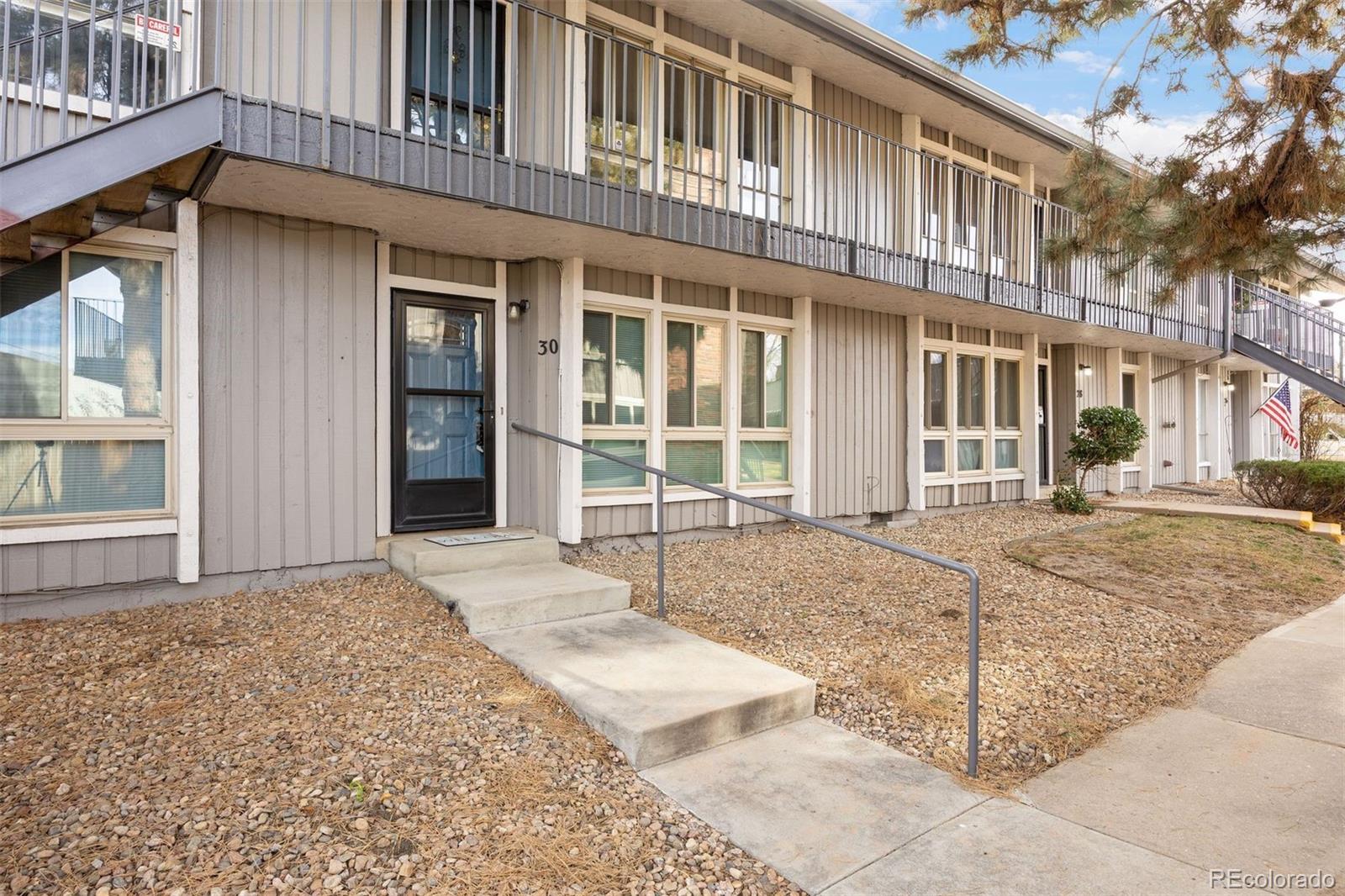 Location, convenience, and thoughtful updates come together in this well-positioned Happy Canyon condo. Just over a mile to two light rail stations, with quick access to I-25 and the Denver Tech Center, this home offers excellent connectivity for daily commuting. All-new windows and a sliding door create a quiet, insulated interior, something you immediately notice once inside. The end-unit condo has been extensively refreshed with new flooring and carpet, fresh interior paint, updated kitchen and baths, and new blinds throughout. The spacious living room features large windows, creating an open and inviting feel. The updated kitchen features stylish gray cabinetry and complimentary hexagon tile backsplash, Frigidaire stainless steel appliances, and a dining area with walkout access that extends daily living to the enclosed back patio. A large storage closet nearby adds everyday functionality. The layout includes two spacious bedrooms, offering flexibility for guests, a home office, or everyday living. The primary suite is filled with natural light and features dual closets and a private 3/4 en-suite bath with granite countertops and a glass-enclosed shower. Multiple storage closets throughout the home add everyday convenience, while a stacked washer and dryer, less than five years old, are conveniently located near the entry. Additional highlights include a covered parking space, new furnace and A/C installed in 2024, and a roof scheduled for replacement this year. Community amenities include a swimming pool, clubhouse with fitness center, garden areas, and outdoor gathering spaces. Close to parks, shopping, dining, and transit, this condo offers an updated, easy lifestyle in a location that truly delivers.
