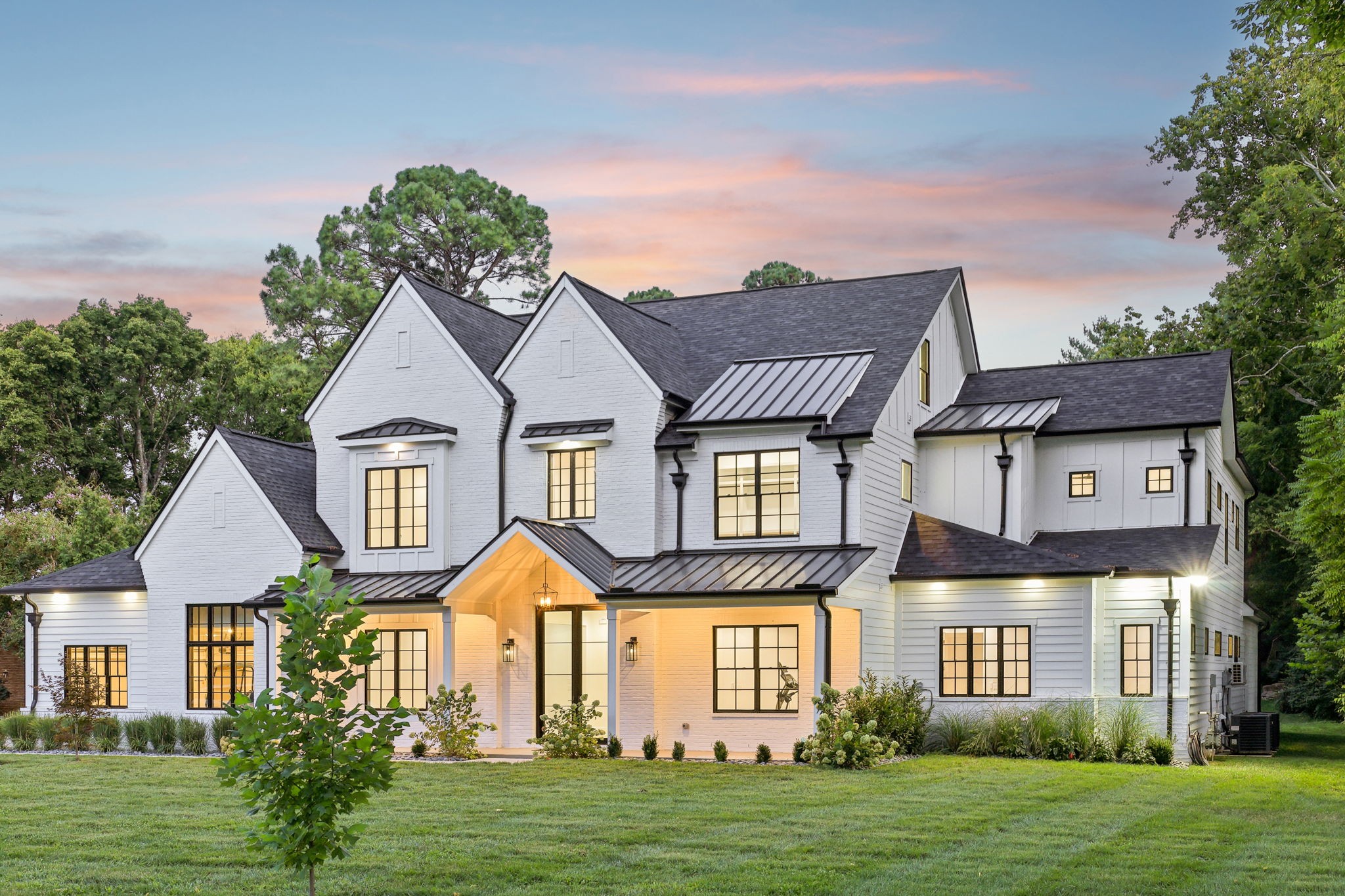 Exquisite, custom-built estate, meticulously crafted by the builder for their own personal residence. This remarkable home offers nearly 12,000 square feet of unparalleled luxury and sophisticated design. 

As you enter, you're greeted by Pella doors and windows that lead into a grand living space. The main floor features two separate studies, perfect for use as home offices. The primary suite is a true sanctuary with a ceiling tub filler, heated floors, and a massive shower and closet complete with a central island. A separate primary retreat offers a private escape. The main kitchen is a chef's dream with dual refrigerators and freezers, while a separate, fully outfitted chef’s kitchen with saloon doors provides an additional space for culinary creativity.

The home is equipped with top-of-the-line amenities, including an Essency hot water heater with two additional heated storage tanks and a whole-house circulating pump. A modern staircase with thick 3 1/2" treads connects the levels. The property also features a six-car oversized garage with professional-grade epoxy flooring, an exercise room, and a reinforced concrete storm shelter with tornado-grade doors. The lower level is outfitted with a full guest suite complete with its own kitchen and a massive laundry room, making it a perfect option for seamless multi-generational living.

Upstairs, you'll find another apartment with its own kitchen and laundry, and a theater room with a wet bar. The second floor also includes two additional bedrooms with en-suites and walk-in closets with built in organizers.

The home has a total of nine fireplaces and is roughed-in for an elevator. Outside, the property is fully irrigated and features an oversized driveway and parking pad. Imported Mexican river stones replace mulch for maintenance-free landscaping, and multi-color LED soffit lighting allows for customizable holiday themes. Security is ensured with a Ring doorbell and two Ring motion-sensor cameras. Tour today!