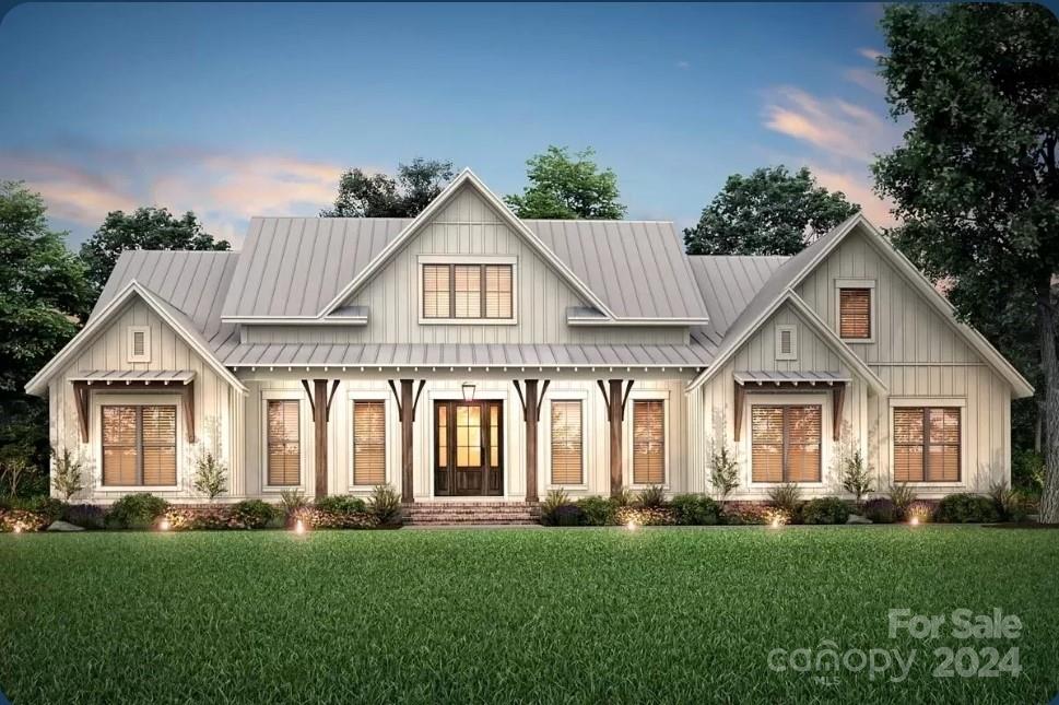 Custom Build Your Dream Home with no construction loan needed!  The photos in the listing are representational only of a proposed build. The buyer will have the opportunity to choose all finishes, both exterior & interior, as well as any additional upgrades.  Overlooking the Par 4 hole #13, imagine a home where every detail is crafted for your comfort & convenience. This thoughtfully designed floor plan features 3 inviting bedrooms & 2 elegant bathrooms on the main floor.  The luxurious primary suite offers a serene retreat, while the open layout seamlessly connects the living areas.  As an added bonus, discover a 4th bedroom & full bathroom situated above the garage, providing extra space.  6 premium lots total situated within the coveted gated section of Tillery Tradition, all offering stunning golf course & water views.  Resort-style living with access to a gated community, outdoor pool, a clubhouse w/ restaurant & Pro Shop, Minutes to Marina, & of course a world class golf course!
