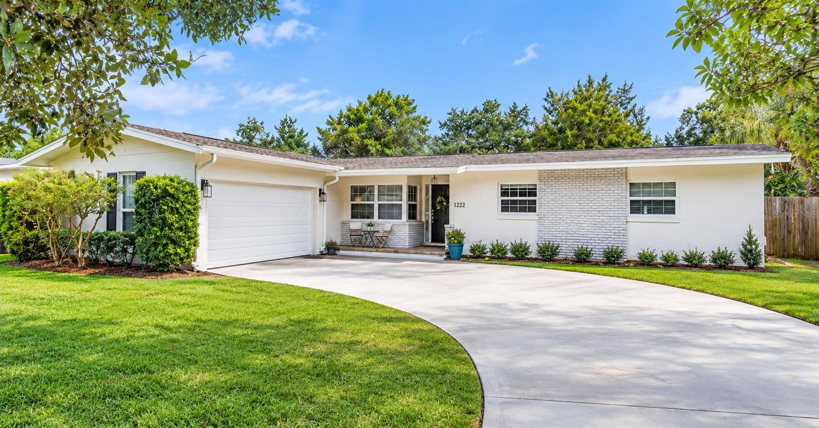 Set on a quiet, landscaped, quarter-acre lot, this 4-bedroom, 2-bath POOL HOME offers a rare combination of privacy, space and neighborhood charm - all within the Kenilworth Shores neighborhood of Winter Park.  Step inside to find an open and inviting great room filled with natural light and framed by sliding doors overlooking the pool and backyard.At the center of the home, the fully remodeled kitchen features shaker-style cabinetry with a built-in pantry, granite countertops, stainless steel appliances and a large breakfast bar with plenty of space for casual dining and entertaining. Step outside to the screened porch and pool, creating a wonderful extension of the living space for year-round Florida living. The landscaped yard includes an irrigation system and plenty of outdoor space. The primary suite features a walk-in closet and fully updated ensuite bathroom showcasing a beautiful granite topped vanity, updated fixtures and new shower. The renovated hall bath features a granite topped vanity with dual sinks, tile and fixtures. Major updates include a BRAND NEW HVAC system installed in 2026, NEWER ROOF and water heater, insulated DOUBLE PANE WINDOWS, and a new septic drainage field in 2024. The oversized two-car garage and large driveway provide plenty of parking and storage. The location puts you close to so much of what makes Winter Park desirable. WINTER PARK HIGH SCHOOL is within walking distance, with Brookshire Elementary and Glenridge Middle also nearby. Park Avenue is a 10 minute drive, while Baldwin Park and the Lake Baldwin trail and dog park are a five minute walk from the home. Enjoy easy access to Full Sail University, UCF, Valencia College, major transportation routes and Orlando International Airport. With its extensive updates, private pool and convenient Winter Park location, this home is truly move-in ready—schedule your private showing today and come see everything 2322 Woodcrest Drive has to offer!