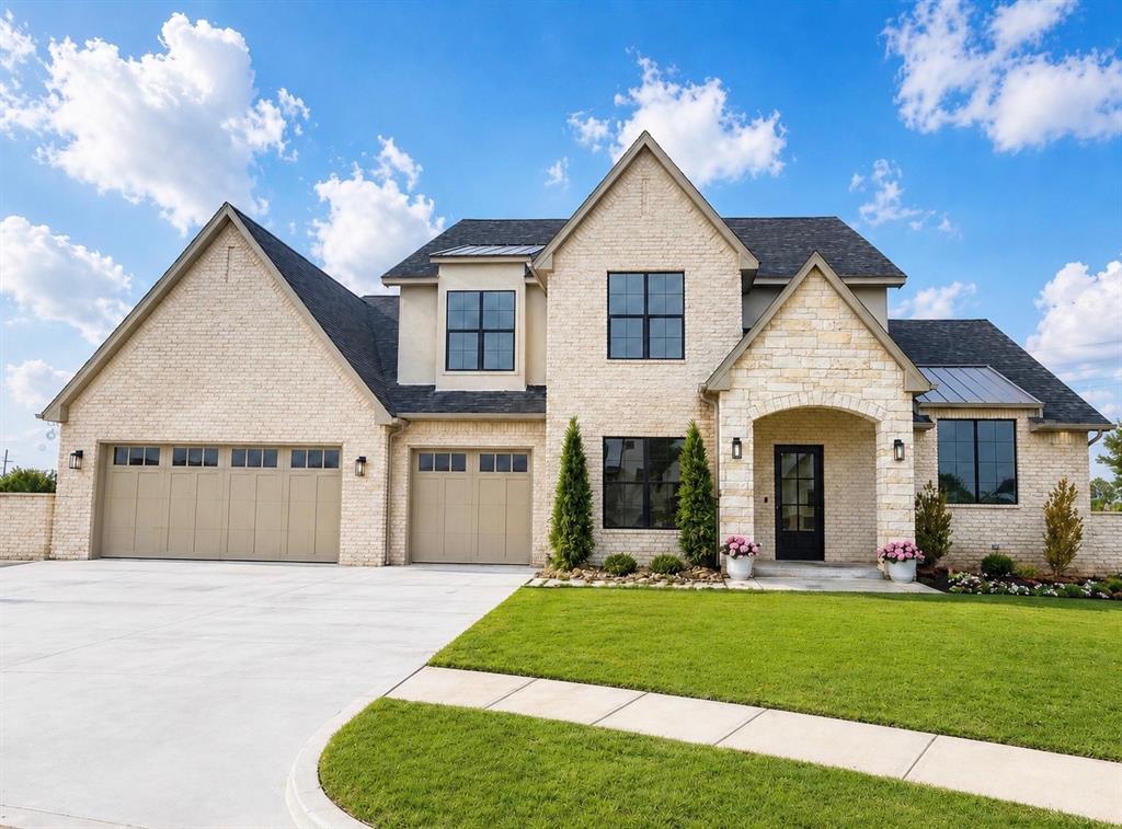 Experience luxury living in this stunning modern home, designed with comfort, style, andfunctionality in mind.From the striking white brick and stucco exterior to the dramaticrooflines and oversized three-car garage with freshly epoxied floors, every detail of this home makes a lasting impression. Inside,soaring vaulted ceilings,oversized windows, and an open-concept layoutcreating a bright and inviting atmosphere,perfect for everyday living and entertaining.Theheart of the home is the chef-inspired kitchen featuring quartz island, custom cabinetry,hidden pantry, and sleek black stainless appliances. The spacious living area offersbeautiful built-ins, a statement fireplace, and a seamless flow into the dining space.Theprivate primary suite provides a relaxing retreat with a spa-like bathroom complete with dual vanities, elegant finishes, and a freestanding soaking tub. Additional features include adedicated office, versatile flex room, safe room, and spray foam insulation for energyefficiency.Blending timeless modern design with thoughtful upgrades and exceptionalcraftsmanship,this home offers the perfect balance of luxury and everyday living. A rareopportunity to own a beautifully designed home on 1/2 of an acre with premium features throughout.