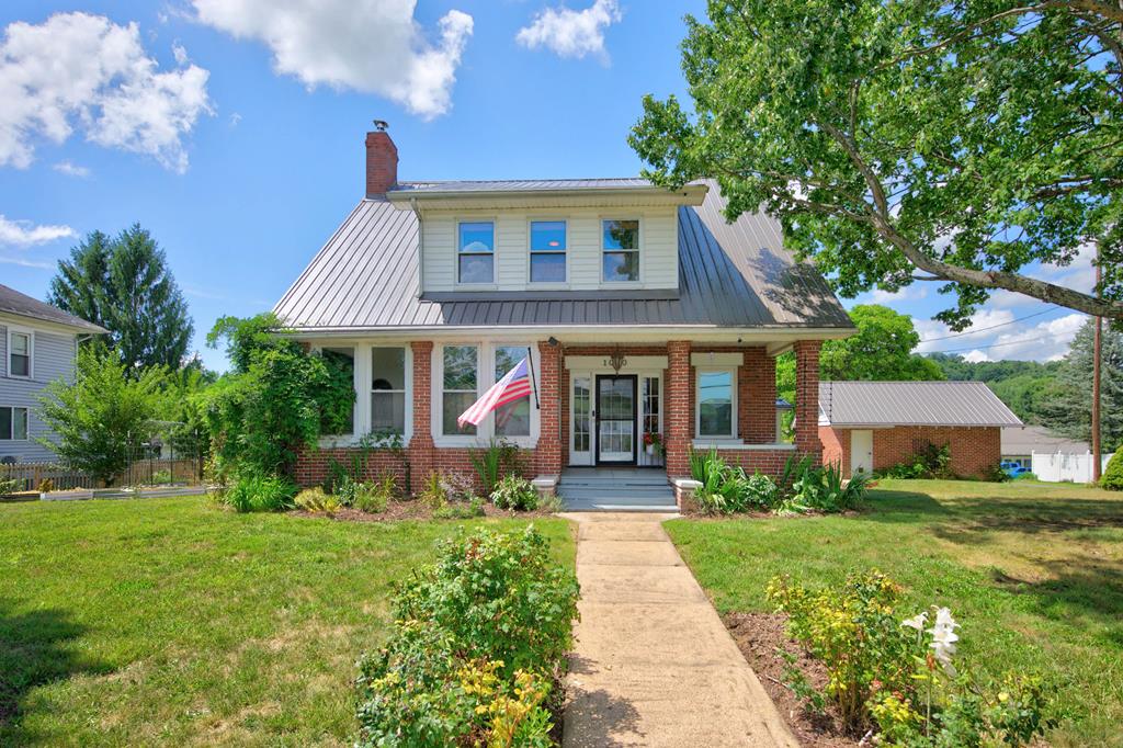 Have you been dreaming of a home with character? Look no further! Conveniently located within walking distance of Historic Downtown Wytheville, this adorable property is ready to call you its new owner! Upon stepping inside, you'll be delighted to find that the home has been thoughtfully updated, yet still retains the original charm that everyone loves! Interior highlights include 3 generously sized bedrooms, 1.5 bathrooms, a fully remodeled kitchen equipped with a 36" gas range and an expansive island with Carrara Marble counters ideal for the family chef, newer mini splits, updated wiring and outlets, a cozy sunroom perfect for enjoying your morning coffee, and so much more! Exterior improvements include a newer metal roof, a wooden privacy fence, a 25x25 detached garage ideal for your family mechanic or craftsman, an old school carriage house with electricity and storage, an established garden area and a yard with multiple mature fruit trees and endless potential to enjoy nature while being minutes away from everyday amenities. In addition to being move-in ready, this home is zoned B2 and could offer the potential to be the prime location for your next business venture! Opportunities like this do not come along everyday. Schedule your private showing today!
