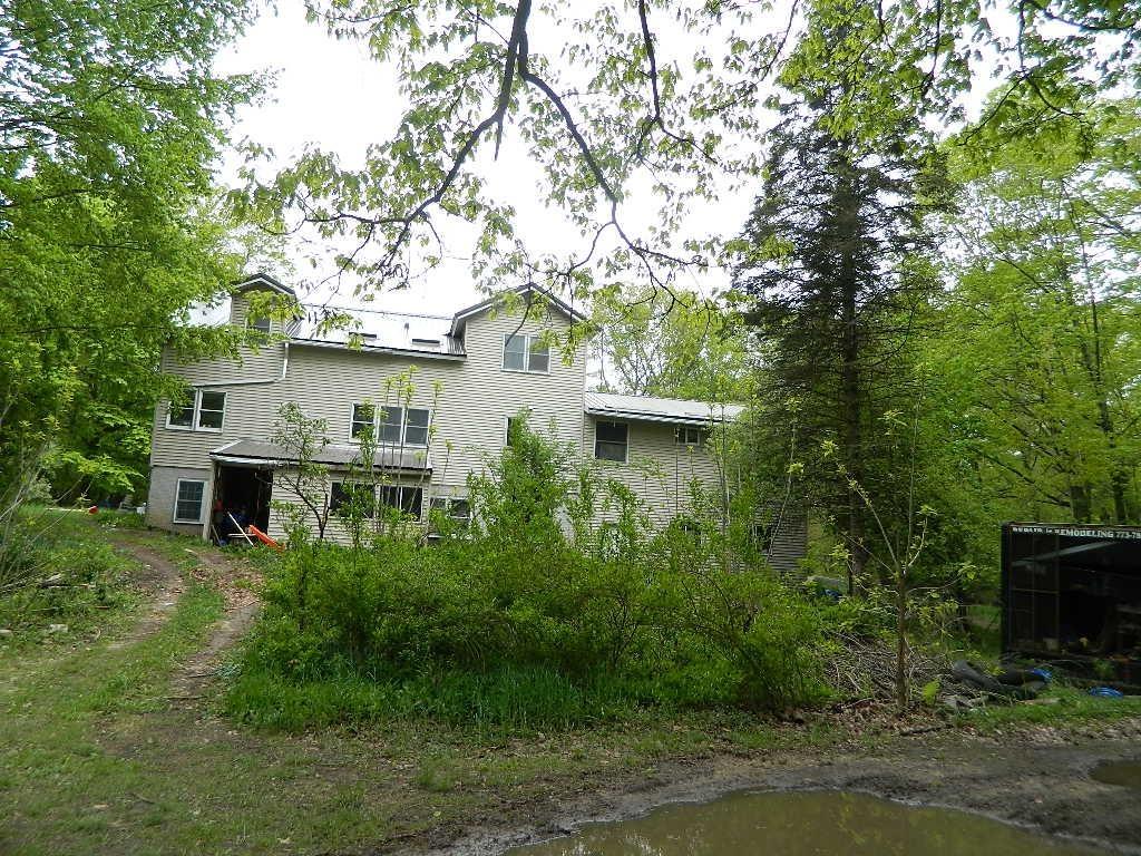 MAGNIFICENT 40 ACRE PARCEL IN THE MIDDLE OF THE SECTION. MATURE TREES, HILLS AND VALLEYS. THE PERFECT PARCEL OF HUNTING LAND IN CENTRAL MICHIGAN. 4-5 BEDROOM, 3 FULL BATHS, 2 BASEMENTS, ONE SET UP WITH COMMERCIAL KITCHEN. HUNTING EQUIPMENT STORAGE ROOM AND MUCH MUCH MORE.