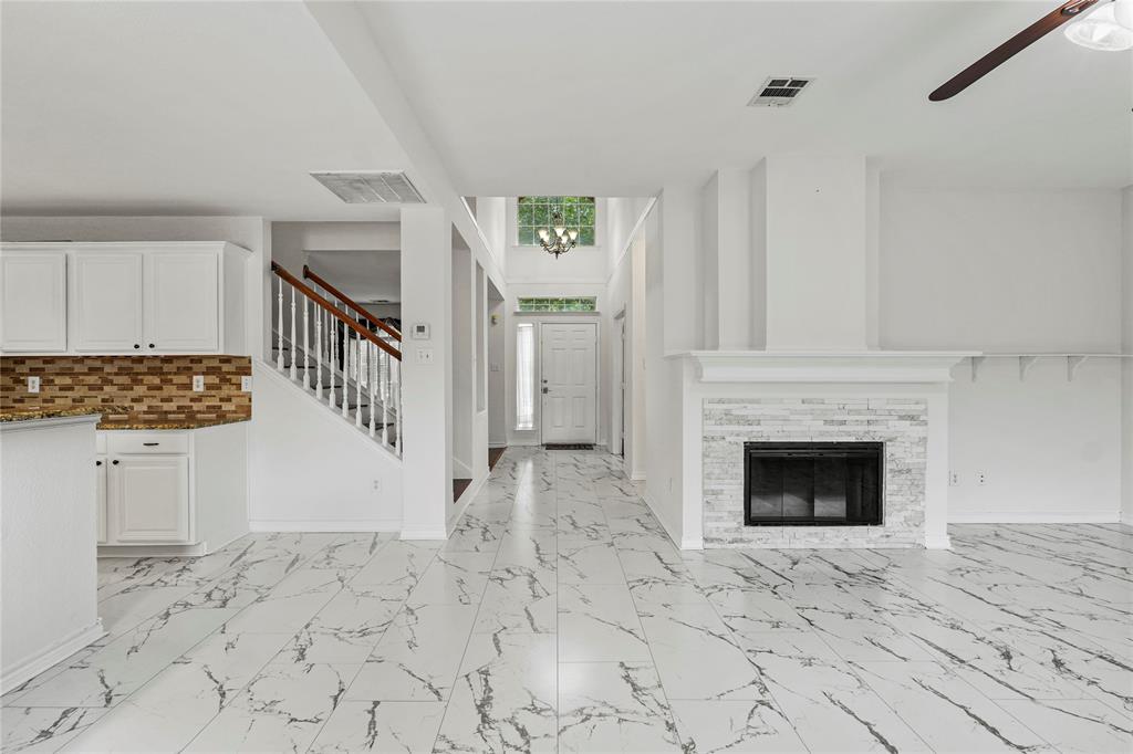 HUGE PRICE ADJUSTMENT + 1 YEAR WARRANTY INCLUDED! $0 DOWN LOAN ELIGIBLE! THE HOME THAT HAS IT ALL! 5 minutes to Legacy West. 10 minutes to Frisco. Updated Features & Appliances. Spacious & Functional. No Mandatory HOA. An Active Home Warranty. In Top Rated School District. Friendly Community. Walkable to Huge Community Park. Large Grassy Back Yard. and... MOTIVATED SELLERS!Welcome to 4817 Carolwood Drive, a beautifully updated 4 bed 2.5 bath home in the heart of West Plano. With over 2,800 sq ft of living space, this spacious and light-filled home offers the perfect blend of comfort, style, and functionality.Freshly painted with new carpet upstairs and gorgeous hardwood floors throughout the main level, this home features two generous living areas, a formal dining room, and a large open kitchen equipped with brand new stainless steel appliances, a gas cooktop, and ample counter space — perfect for entertaining or family gatherings.The oversized primary suite includes a large sitting area, fireplace, dual vanities, a separate shower, soaking tub, and a large dual entry walk-in closet. All secondary bedrooms are well-sized with plenty of storage. The office on the main level can be converted to an additional bedroom if desired! Step outside to a lush backyard with new green grass, a full sprinkler system, and a patio ideal for outdoor relaxation. Located in the desirable Wellington Run neighborhood with no HOA, and zoned to top-rated Plano ISD schools including Gulledge Elementary, Robinson Middle, and Jasper High. Easy 5 minute access to Legacy West, major employers, shopping, dining, the tollway, entertainment. Did we mention this home has it all?