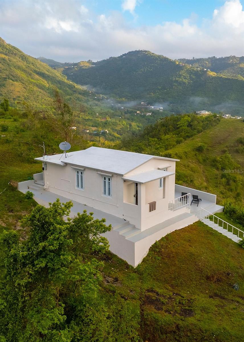 Turnkey Short-Term Rental Business in Cayey – Somos Instantes. 
Escape to your own private mountain retreat! This 9-acre property features three fully furnished cabins with private jacuzzis and breathtaking views of the lush Cayey mountains. Fully operational as a short-term rental business, it is already generating consistent income. The property also offers plenty of room to create additional cabins, opening the door to expand this thriving hospitality business. Experience the perfect blend of luxury, privacy, and a proven income-producing opportunity—all in one exceptional and inviting location.