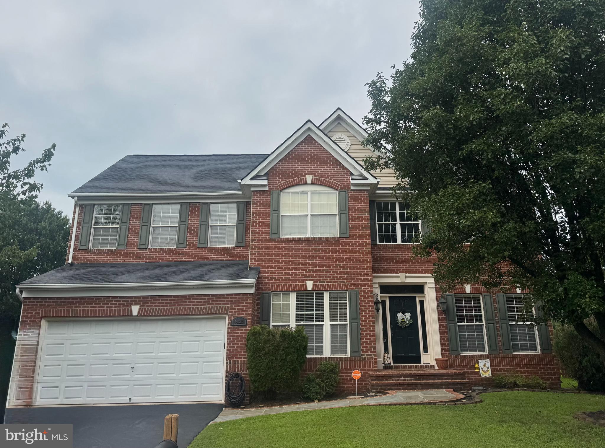 Welcome home to this beautiful brick front home in the convenient Ashbrook Village community of Ashburn featuring three finished levels of living space! The customized walkway greets you as you walk up to this home. A grand two story foyer opens to a formal living space & private home office ideal for working from home! The formal dining room leads into the spacious kitchen w/ center island, double wall oven, upgraded refrigerator & dishwasher as well as large eating area. Expansive family room with fireplace & wall of windows.  Large primary suite features a luxurious bath with separate vanities, soaking tub, separate shower & large walk-in closet with window. The upper level features three additional bedrooms, an upgraded second full bath with dual sinks & conveniently located bedroom level laundry room. The finished basement offers ideal entertaining space with a huge recreation room, game room with bar, den/playroom & 3rd full bath. Custom rear patio with pergola overlooks fenced rear yard. Updated roof, hot water heater, nearby community pool & more. Incredible location near schools, dining, shopping, entertainment, One Loudoun & more! Photos will be posted Thursday August 20.
