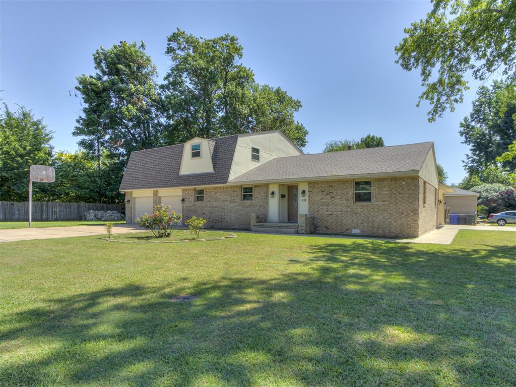Price Improvment! Charming Campus Beauty or Multi-Family Home Ready for Occupancy! This property offers a fantastic opportunity for both owner-occupants and investors seeking a solid income-producing home. Featuring 4 spacious bedrooms and 2 full bathrooms, it’s designed to accommodate both comfortable living and versatility.Two bedrooms and a full bath are located on the first floor, with professionally refinished hardwood floors throughout the entryway, living room, and two large bedrooms. The first floor also showcases custom oak cabinetry, solid oak and ash trim and doors, a cedar-lined entry closet, surround sound wiring, and a custom oak media cabinet. A cozy, efficient wood-burning stove completes the space, with fresh texture and paint throughout.The kitchen, bathrooms, and laundry room have all been beautifully updated with quartz countertops and durable tile flooring. Upstairs, you’ll find two generously-sized bedrooms with walk-in closets, along with a versatile flex room, complete with built-in cabinetry—ideal for a home office, nursery, or guest room. At one end of the home, you’ll find an oversized two-car garage, while the opposite end offers an additional two-car garage, perfect for extra storage or workspace. Additional features include new exterior paint, all-new windows, a built-in in-ground storm shelter, a sprinkler system in the front yard, and a convenient laundry chute. Perfectly situated in a prime location, this home blends the charm of campus living with modern, high-end amenities. With too many updates to list, this is truly a one-of-a-kind property!