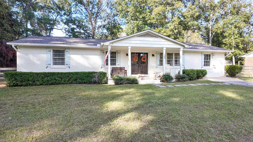 New roof in 2020, new HVAC system in 2021, new spray foam, newer gutters, and cute as a button! This house has it all! With over 1,500 Sq Ft, you have space for all your needs. The well-equipped kitchen offers stainless appliances and granite counter-tops, and the second living area with brick accent wall would make a perfect man-cave, she-shed, exercise room, playroom, or office. The modern, light and airy paint is further accented by ship-lap in the kitchen and bathrooms. Outside, you have over half an acre to stretch out. The back yard is fully fenced with two large gates, and features a large storage building. Don't forget, no city taxes here!