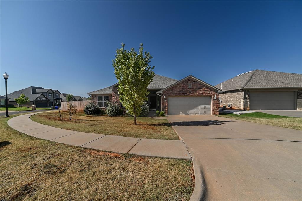 This stunning 4-bedroom, 2-bath home with a 2-car garage offers the perfect blend of comfort and functionality for your family. The open-concept kitchen is beautifully designed with elegant granite countertops, including a premium gas range—ideal for both everyday living and entertaining. The spacious primary suite features a relaxing Jacuzzi tub and an oversized walk-in closet. Conveniently located near the University of Oklahoma and Interstate 35, this home provides easy access to shopping, dining, and commuting routes. Situated on a corner lot with a large backyard, it also includes an above-ground storm shelter located in the garage for added peace of mind.
