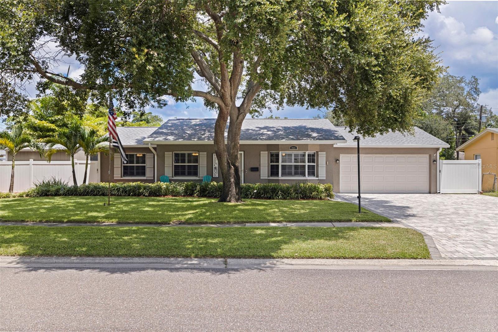 FLORIDA PLAYHOUSE -  POOL HOME ON DOUBLE LOT WITH RV PARKING AND MULTIGENERATIONAL LAYOUT. Offered for the first time, this is an outstanding value for the money. Original family-owned residence offers a thoughtfully maintained living space is all on one level, situated on an oversized double lot (11,460SF) in a high-and-dry location with no flood insurance required! Located near Allendale and Allendale Terrace, this home offers a spacious split-plan layout that is ideal for both privacy and family gatherings. Vacation in your backyard under the screened-in pool and lanai, a charming gazebo, with plenty of green space for play or relaxation. This home provides a private outdoor retreat ideal for weekend BBQs, gatherings, and sunny afternoons at home. Inside, the home is nicely updated, creating a warm and functional environment for everyday living. The current owners, passionate Disney enthusiasts and grandparents, have filled the home with joy, creativity, and character, giving it the feeling of a private retreat designed for memory-making weekends with grandchildren. Whether you're hosting family, welcoming guests, or simply enjoying the space for yourself, this property offers flexibility, comfort, and room to grow—all just a short drive from the beaches, downtown St. Petersburg, and local attractions. Plus, a 2-car garage, oversized parking pad, paved RV/boat pad with alley access, and 2 “tuff sheds” offer storage and functionality. Recent improvements include NEW ROOF and gutters (2024), new electric panel, and water heater, providing peace of mind for years to come. The Rain Bird Irrigation system is on a deep well, saving money while helping you maintain a lush green yard.  The permanent JellyFish Outdoor lighting is perfect for setting the mood and or being festive year-round. With its move-in-ready condition, entertainer’s ease, and versatile spaces, this is a home where memories happen. Comps in the area support pricing in the $800K–$845K range, making this home with oversized outdoor living and functional versatility a financially savvy decision and a rare opportunity not to be missed.