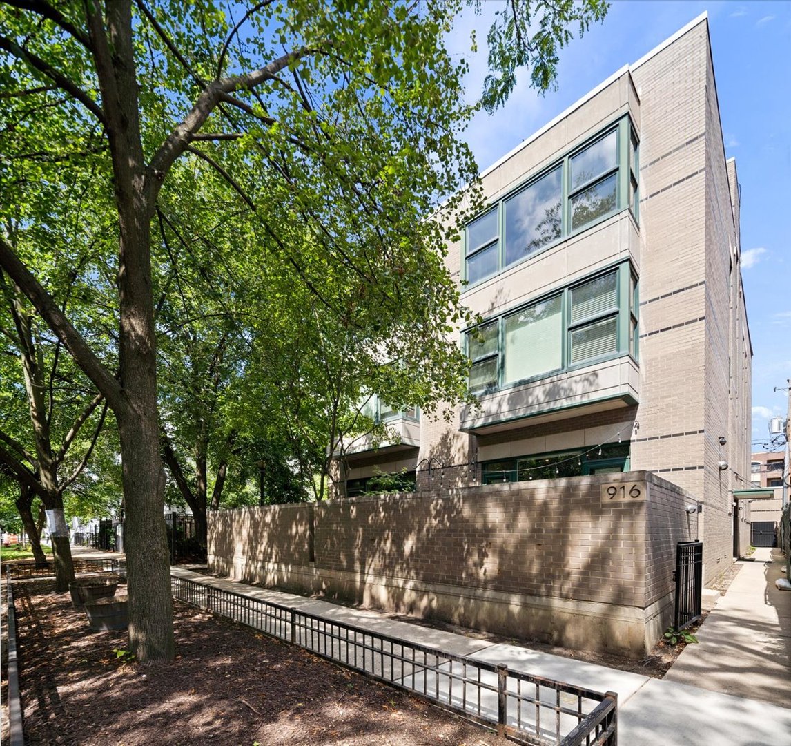 Absolutely stunning three-bedroom condo located in a boutique building in the heart of Lakeview. From the moment you walk in, you're greeted by oversized windows that flood the spacious living area with natural light. The sleek, modern kitchen stands out far from your typical cookie cutter design and flows seamlessly into an inviting living room featuring a gorgeous gas fireplace, built-in speakers, and custom open shelving.    Ideal for entertaining, the dedicated dining area comfortably fits a six-person table-no eating on the couch necessary. One of the bedrooms has been brilliantly customized by California Closets, featuring a built-in home office on one side and a hidden guest suite on the other, complete with a Murphy bed, closet space, drawers, and shelving.Enjoy your own private,  built-out rooftop deck! Perfect for those warm Chicago summer nights. Walking distance to the 'L', Southport corridor, Wrigley field and the Lake!  Additional perks include garage parking and an oversized storage room. This one truly checks every box. A must see!