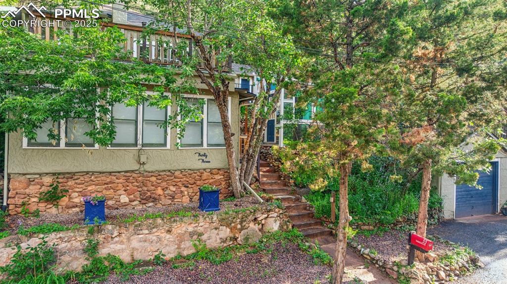 Amazing opportunity in the heart of Manitou Springs!  This 2 Bedroom, 2 Bathroom home features a shed, greenhouse, spacious deck, 1 car detached garage and 3 dedicated on-street parking spaces in front. Many updates including new class 3 Roof in 2017, new Rinnai Direct vent gas wall furnace in 2018, new water heater 2019. Located on the west end of town means convenient access to 24/Serpentine Road allowing for easy commutes. Enjoy the Manitou lifestyle, close to parks, walking/hiking trails and only minutes from all that downtown Manitou Springs offers.
