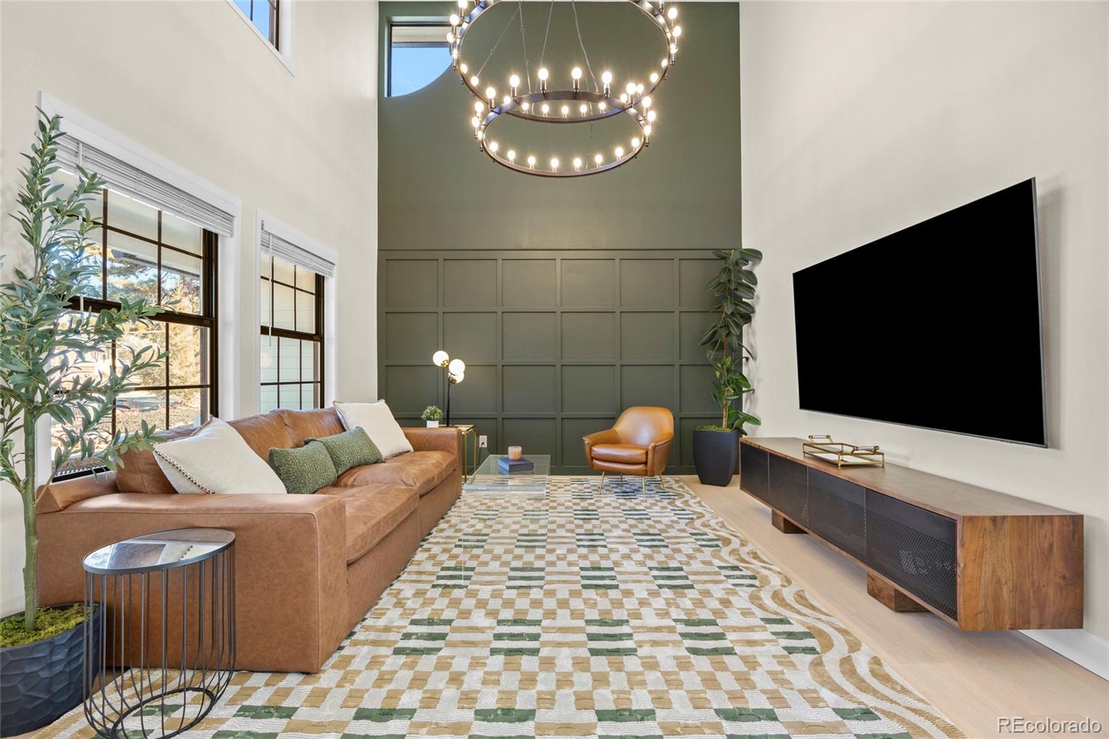 A true stunner! Looking for a main level primary suite with amazing windows and huge spa-like bathroom? Don’t miss this exceptional, FULLY remodeled and reimagined home. Every inch has been carefully designed with quality, intention, and timeless style. The result is a turnkey home offering FIVE! spacious bedrooms (all above grade- 1 on the main and 4 upstairs) , including an expansive main-level primary suite, plus four (4) additional bedrooms upstairs. Five bathrooms and a generous laundry room with direct access to a newly built, fully enclosed dog run.Move right in and enjoy gorgeous craftsmanship and high-end finishes throughout, including gorgeous Brazilian white oak floors, vaulted ceilings, custom details, and abundant natural light from the numerous oversized windows. The chef’s kitchen is the heart of the home, featuring premium appliances and Taj Mahal quartzite-perfect entertaining. Beyond the beautiful aesthetics, this home offers peace of mind with major system upgrades including a brand-new HVAC system with two A/C units, updated roof, siding, and fresh exterior paint. The fully finished basement provides excellent flexibility for guests, recreation, or entertaining, with room to expand and ample storage. Set on an expansive 16,000 sq ft corner lot backing to Greenwood Gulch, this property offers rare privacy and charm in a sought-after neighborhood. Greenwood South is a small enclave ideally located just west of I-25, a short walk to Palos Verdes Park, minutes to the highway, and within walking distance to Greenwood Athletic Club and The Landmark’s premier dining, shopping, and entertainment. Zoned to top-rated Cherry Creek schools, including Greenwood Elementary and Cherry Creek High School. Form, function, beauty and everything you’ve been looking for- wrapped in a bow and just waiting to welcome you home!