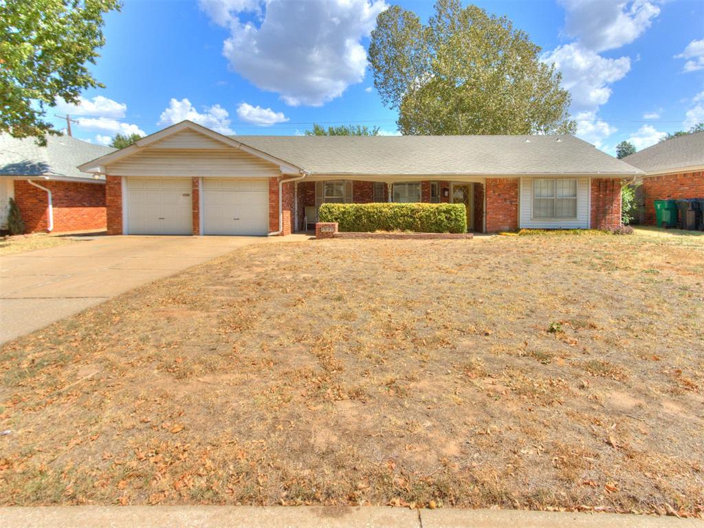 This home has a lot to offer, with plenty of space, storage, and character.  Multiple living areas, warm woodwork, and built-ins give the home a personality you don’t find everywhere. The main living area is anchored by a full brick fireplace wall with built-in shelving and cabinetry. The spacious kitchen offers abundant cabinetry and workspace, including a built-in desk area, while the breakfast nook features a charming window seat. Two pantry/storage closets add even more functionality. The primary bedroom offers two closets, and additional cabinetry can be found in the utility room. One of the standout features is the large, enclosed sunroom, surrounded by windows and multiple skylights—perfect for an additional living area, game room, or hobby space. An in-ground storm shelter in the garage adds extra peace of mind. With generous storage, flexible living spaces, and plenty of original character, this home offers a great opportunity to make it your own.