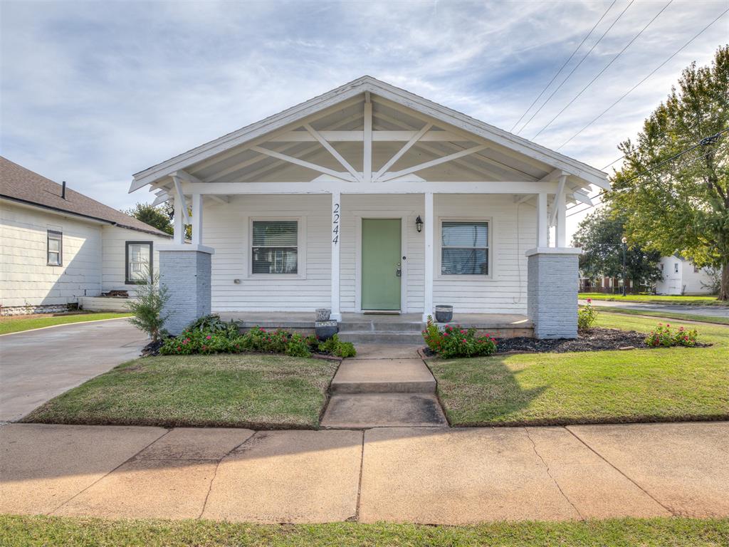 Welcome to this charming 1925 bungalow where classic OKC character meets thoughtful updates! Situated on a corner lot in one of OKC’s established historic areas, this 3-bedroom, 1-bath home offers 1,343 square feet filled with character, including beautiful original hardwood floors, an inviting covered front porch and a distinctive living room mock fireplace with built-in shelving.The spacious living and dining areas flow easily together and into the updated kitchen featuring granite countertops, stainless steel appliances, subway tile backsplash and abundant cabinet and counter space. A flexible bonus room provides the perfect spot for a home office, hobby room, workout space or additional living area.The backyard is made for enjoying Oklahoma evenings! A large patio and pergola create a wonderful outdoor entertaining space overlooking the fenced yard. A detached 2-car garage, sprinkler system and additional space for RV or boat parking add even more versatility. Plus, the composition roof was replaced in 2026!And the location is hard to beat! Centrally located with convenient access to the Plaza District, Paseo Arts District, Downtown OKC and Bricktown, plus nearby restaurants, shopping and entertainment. Easy access to major highways and Will Rogers International Airport makes getting around the metro a breeze.Classic charm, modern updates, great outdoor living and a fantastic central OKC location, this home is ready for its next chapter. Welcome Home!