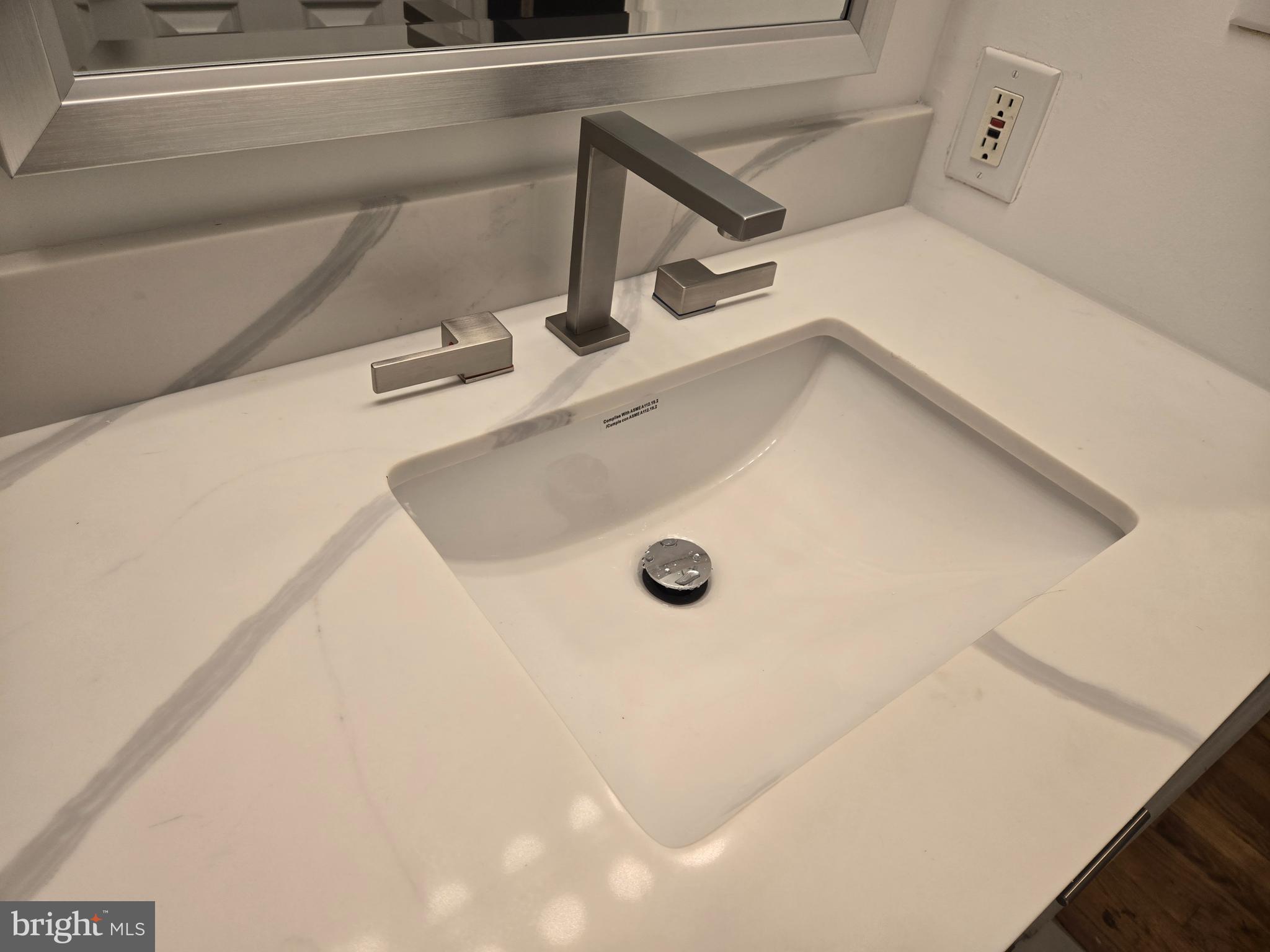 Only $2.02 per SQFT (size matters)! Location, Location, Location translates into Security, Security, Security in this high-end renovated, ready-to-move-in, largest (864 sq. ft.) 1 bedroom unit with additional storage room (25 sq. ft) unit in St. Paul @ Chase, which in one of the most secure and well managed condominium bldgs in Baltimore. Newly remodeled kitchen and bath with top of the line Calacatta Sierra quartz counters. Keyless entry and surveillance cameras throughout! If you can find a more secure bldg in historic Mt. Vernon neighborhood you can take $100 off rent! This vary rare gem has real oak hardwood flrs, Energy Efficient Windows, brand new Central AC system, Rheem Water Heater and LG - 5.0 Cu. Ft. HE Smart Mega Capacity All-in-One Electric Washer/Dryer Combo with Steam and Ventless Inverter Heat Pump in Black Steel! The listing agent has owned this unit for over 20yrs and can attest the the bldg hasn't lost electricity more than once!!!  Also, you will be hard pressed to find another hi-rise anywhere in the world that has a trash shute on each floor that smells better - aka the cleanliness throughout!! 24hr Front desk. Optional Garage Spaces $165/m with ultra-convinient valet service. On Hopkins Shuttle & Purple Circulator routes.  The Spot Pizzeria and a Convenience store on the 1st floor throught lobby! Email agent to request an appt. For current EMT, police or firefighters - as an appreciation of all you do for us - the 1st month rent will be $0. Current tenant moving out in May. Ask about discounts for multi-year leases. Hurry, this gem will not last long!