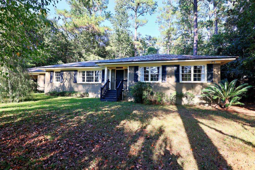 Come home to this beautiful brick house full of warmth, space, and thoughtful updates! With over 2,500 square feet, there's plenty of room to relax, entertain, and make lasting memories. 3 separate living/family areas, plus extra pantry/craft/cooking area.  You'll love the gleaming hardwood floors, bonus family room, and the peace of mind that comes with new appliances — including a dishwasher,, sump pump, A/C, and water heater. The basement has been fully encapsulated, adding comfort and protection year-round.  The kitchen also includes a standalone ice maker with a new pump system, plus refreshed stove and ovens ready for your favorite meals.  Located in a stable, convenient neighborhood just minutes from downtown, this home blends classic charm with modern comfort — the perfect place to put down roots.  Large fenced in back yard provides plenty of protected outside space!! Call your favorite Realtor today -- make an appointment now....