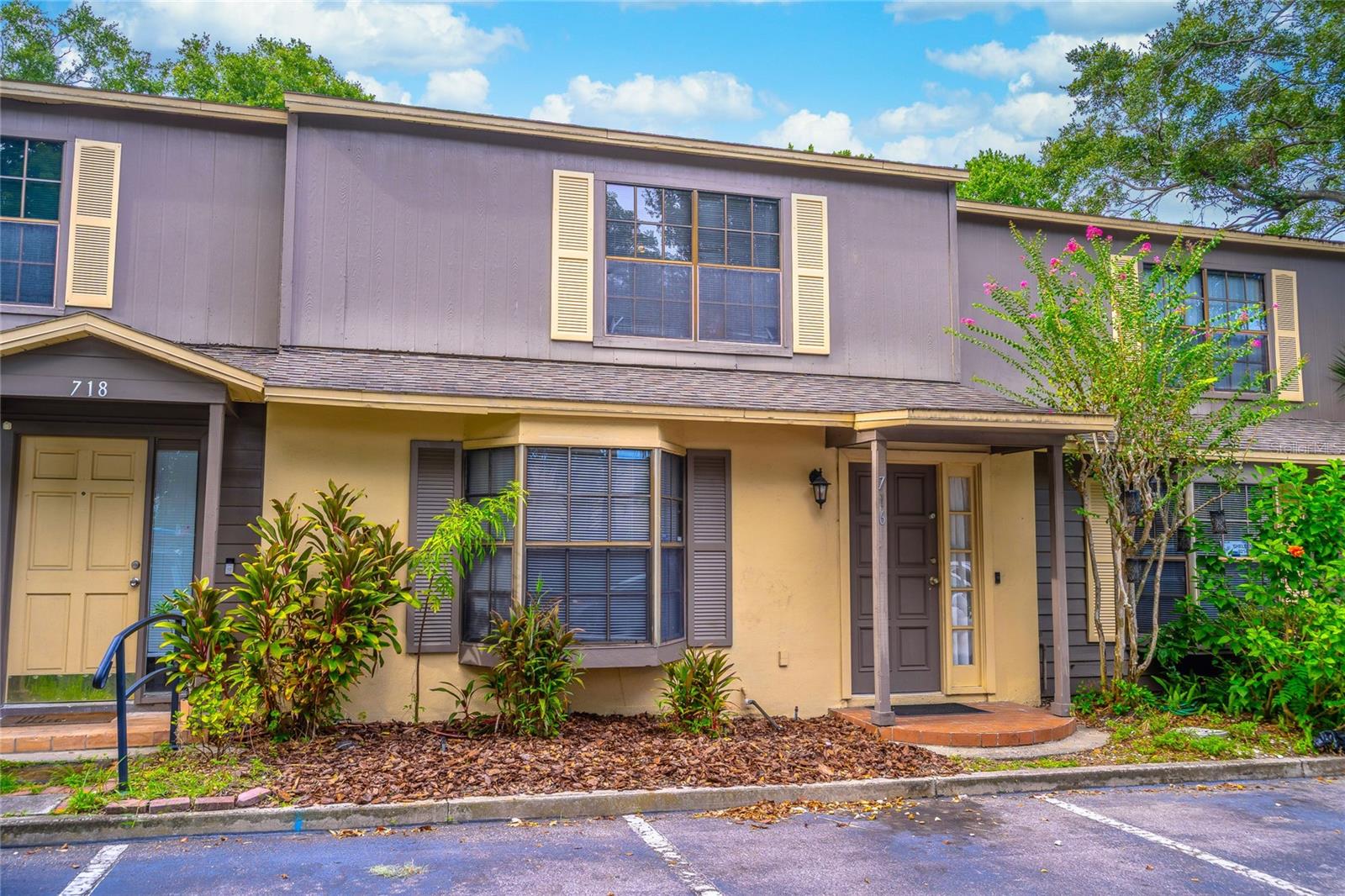 Prime Location in College Park! Nestled on Edgewater Drive, this charming 2-bedroom, 2.5-bath townhome places you just minutes from the vibrant shops and restaurants of College Park and the exciting new Packing District. Step inside to find a beautifully updated kitchen with 42-inch cabinets, stainless steel appliances, under-mount lighting, and pantry pullout drawers. A convenient pass-through opens to the spacious living room, where neutral-toned LVP flooring and a cozy wood-burning fireplace create the perfect atmosphere.
Anderson glass French doors lead to your private, fenced-in patio with an additional storage closet—ideal for entertaining or relaxing outdoors. Upstairs, both bedrooms feature walk-in closets, with the primary suite offering an attached full bath. The downstairs powder room has been thoughtfully updated for modern style.
Additional highlights include a quiet interior thanks to quality insulation and firewalls, plus peace of mind with an HOA that covers exterior maintenance, termite bond, roof (2018), and two designated parking spots. With unbeatable proximity to Downtown Orlando, Winter Park, Advent Health, Orlando Health, I-4, and the 408, this townhome is the perfect low-maintenance first home in the heart of it all.